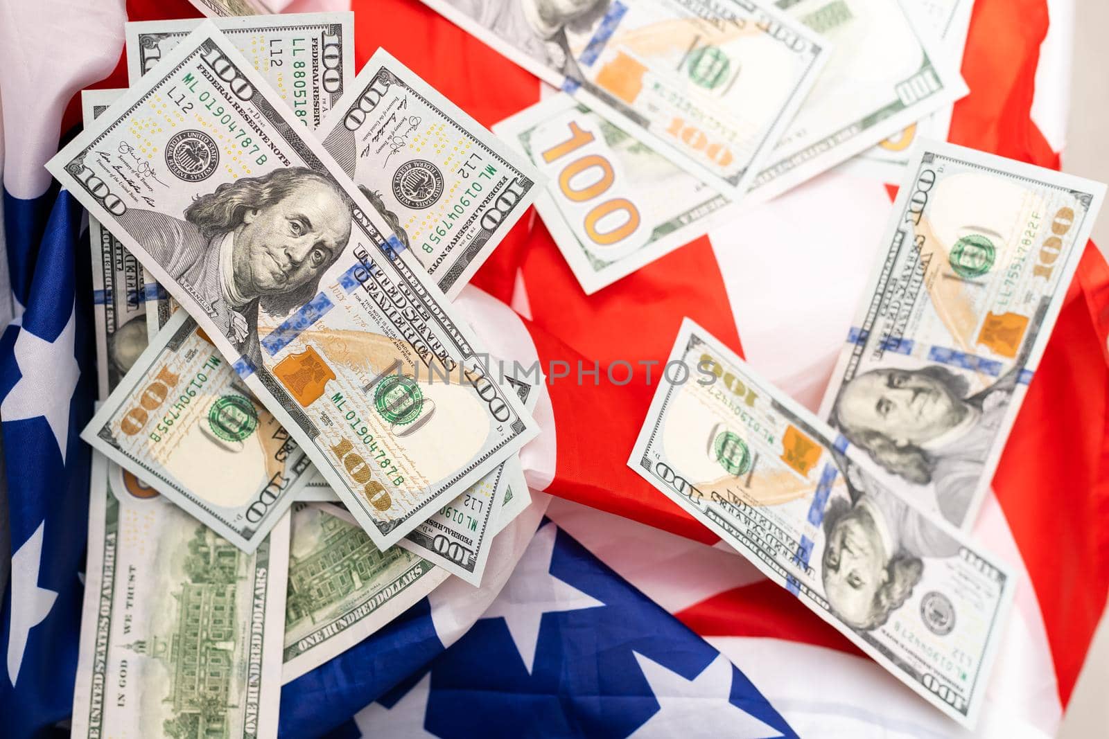 American dollars and flag. Stock images. Top image.