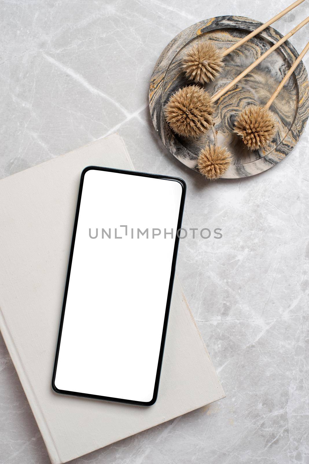 smartphone with isolated screen on marble desk by Desperada