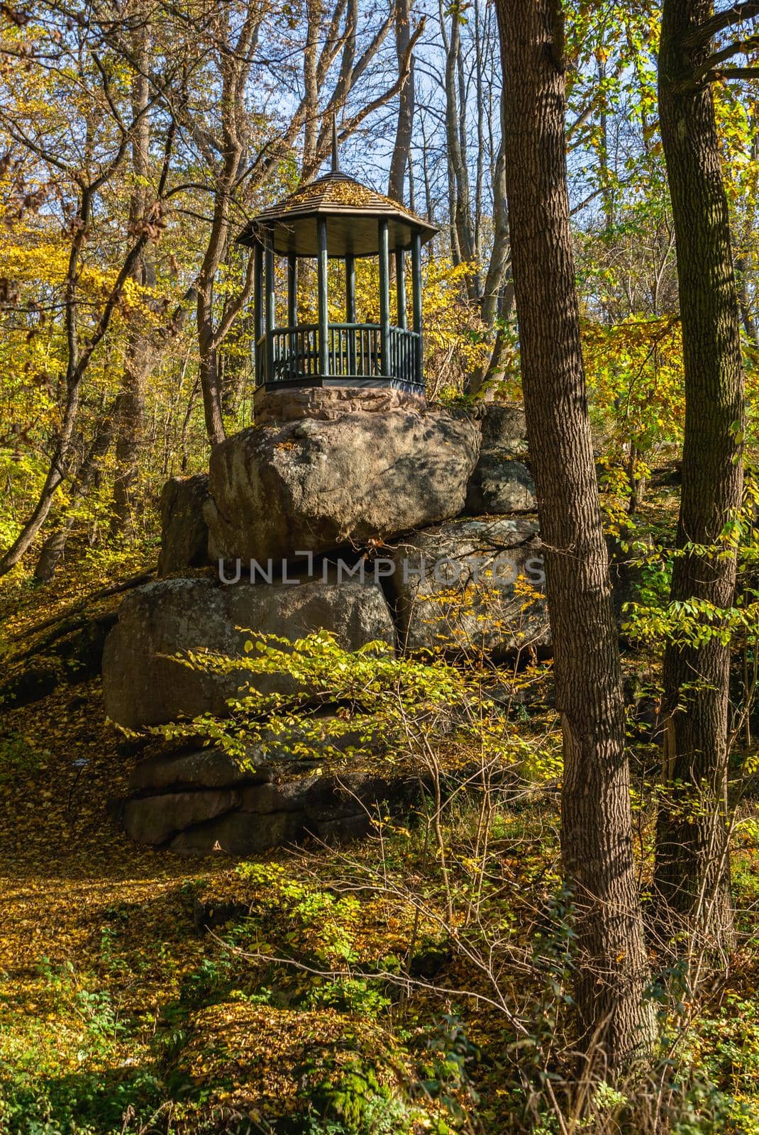 Alcove in the Sofievsky arboretum or Sofiyivsky Park in Uman, Ukraine, on a sunny autumn day