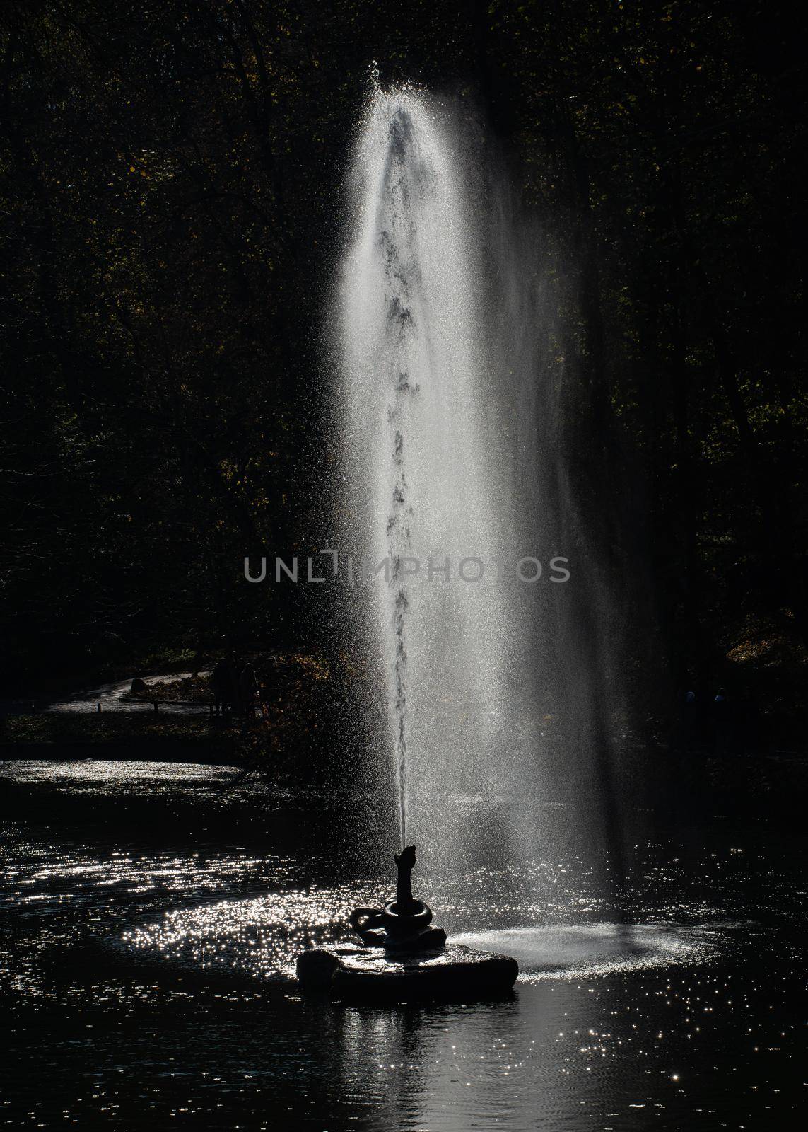 Snake fountain in the Sofievsky arboretum or Sofiyivsky Park in Uman, Ukraine, on a sunny autumn day