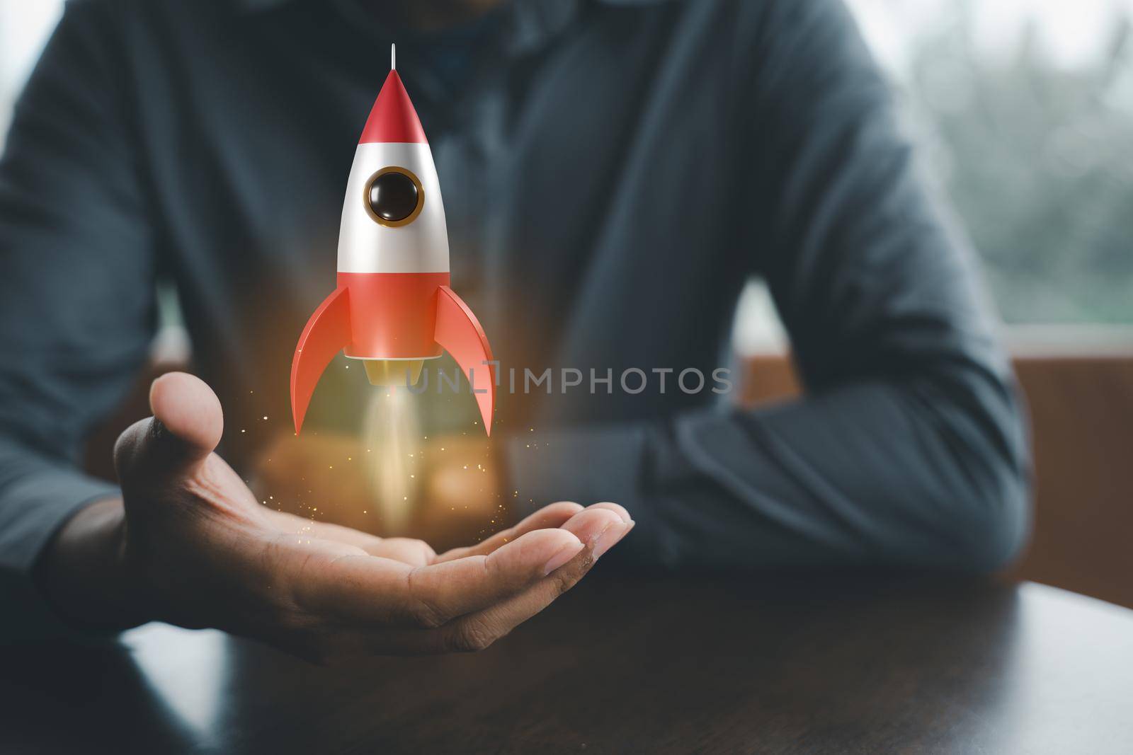 Business startup. Businessman holding rocket 3D icon on hand, rocket takes off launching and soar flying out, marketing on modern virtual interface, business digital innovation accelerate idea concept
