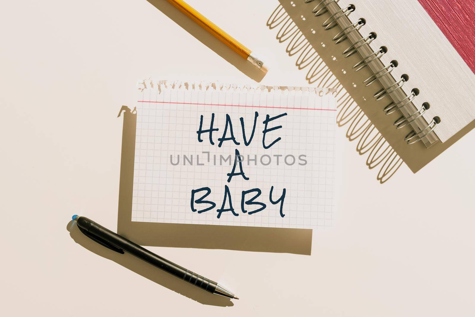 Text showing inspiration Have A Baby. Business idea Advice to get pregnant and having a kid Recommendation Man pointing finger holding trophy cheering reaching project success. by nialowwa