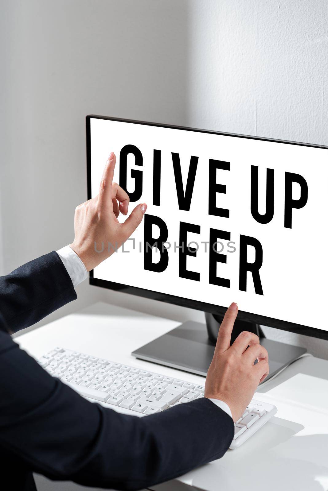 Conceptual display Give Up Beer. Concept meaning Stop drinking alcohol treatment for addiction healthy diet Hand Holding Panel Board Displaying Latest Financial Growth Strategies. by nialowwa