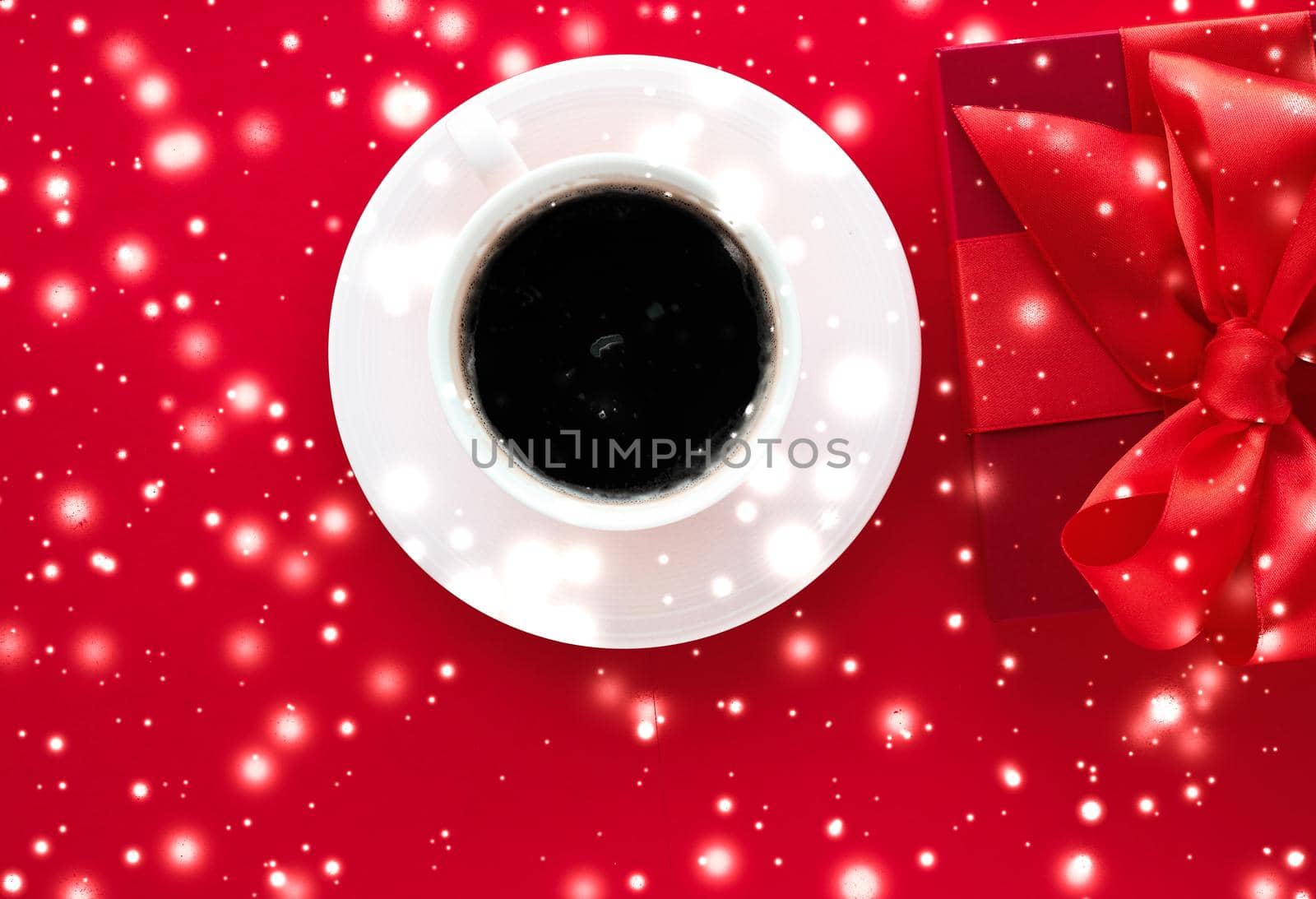 Hot drink, luxury festive menu and Valentines Day card concept - Winter holiday gift box, coffee cup and glowing snow on red flatlay background, Christmas time present surprise