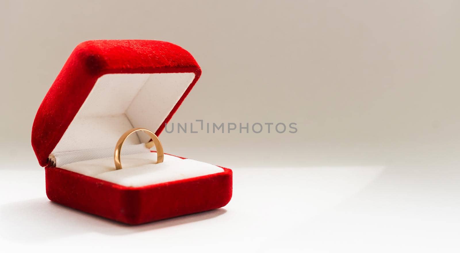 Red box for gold ring on a white background.