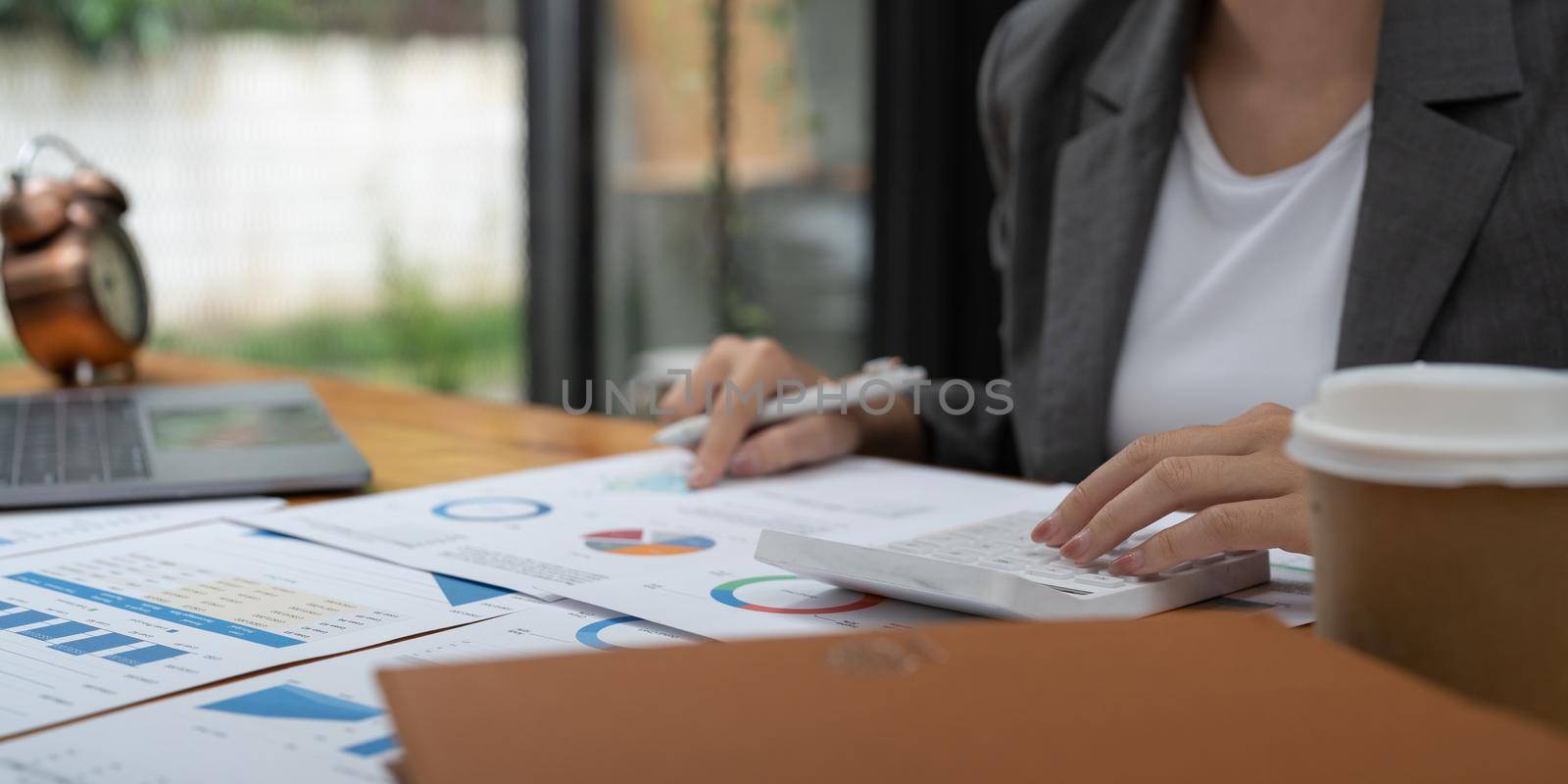 Accountant finance worker reviewing the investment results. To report at the meeting, audit ideas And investment results.