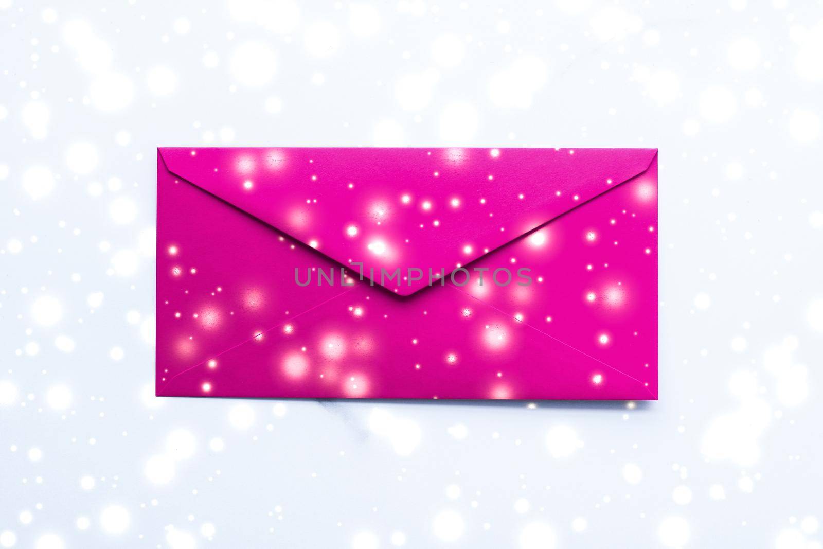 Greetings, postal service and online newsletter concept - Winter holiday blank paper envelopes on marble with shiny snow flatlay background, love letter or Christmas mail card design