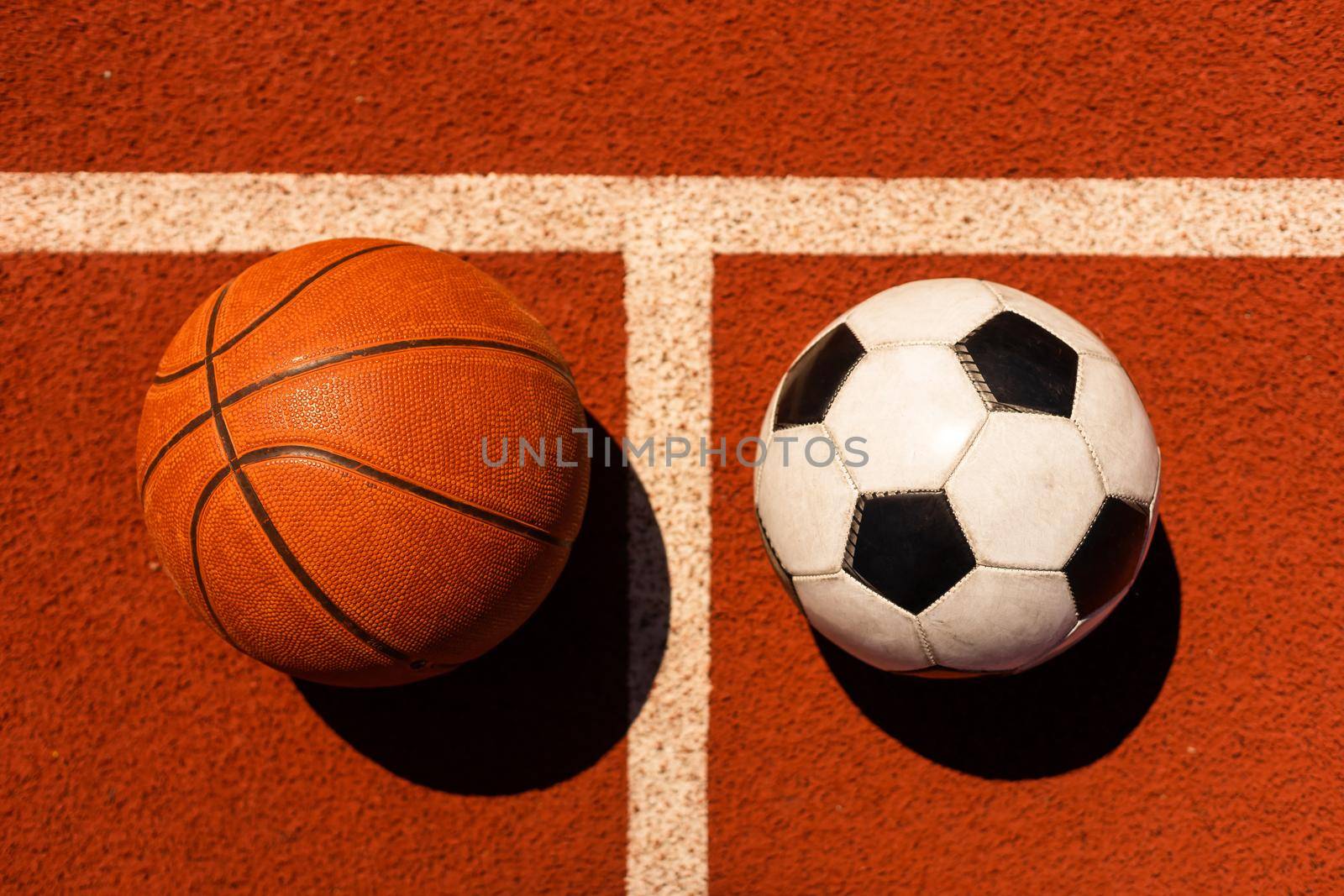 Set of sport equipment, soccer and basketball balls.