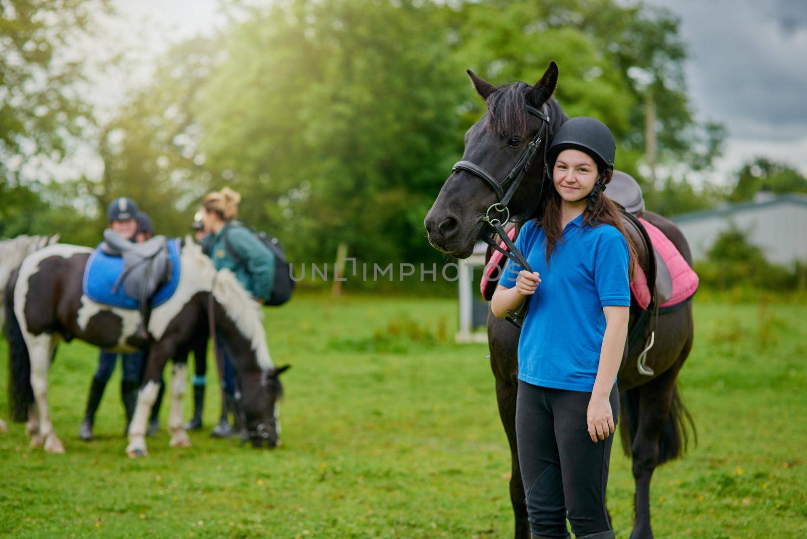 Life is better with a horse. young girls with their horses outdoors
