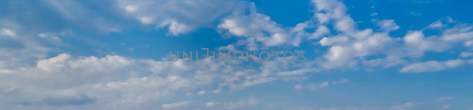 Blue sky with white clouds as a background by Godi