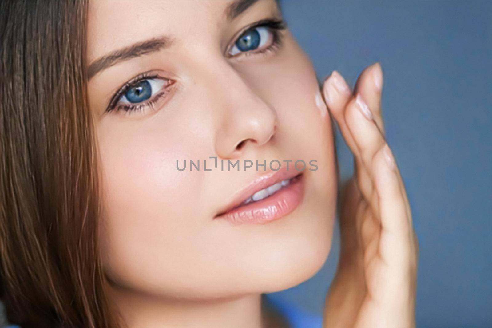 Beauty, skincare and cosmetic product, woman applying anti-aging face cream on her skin, portrait