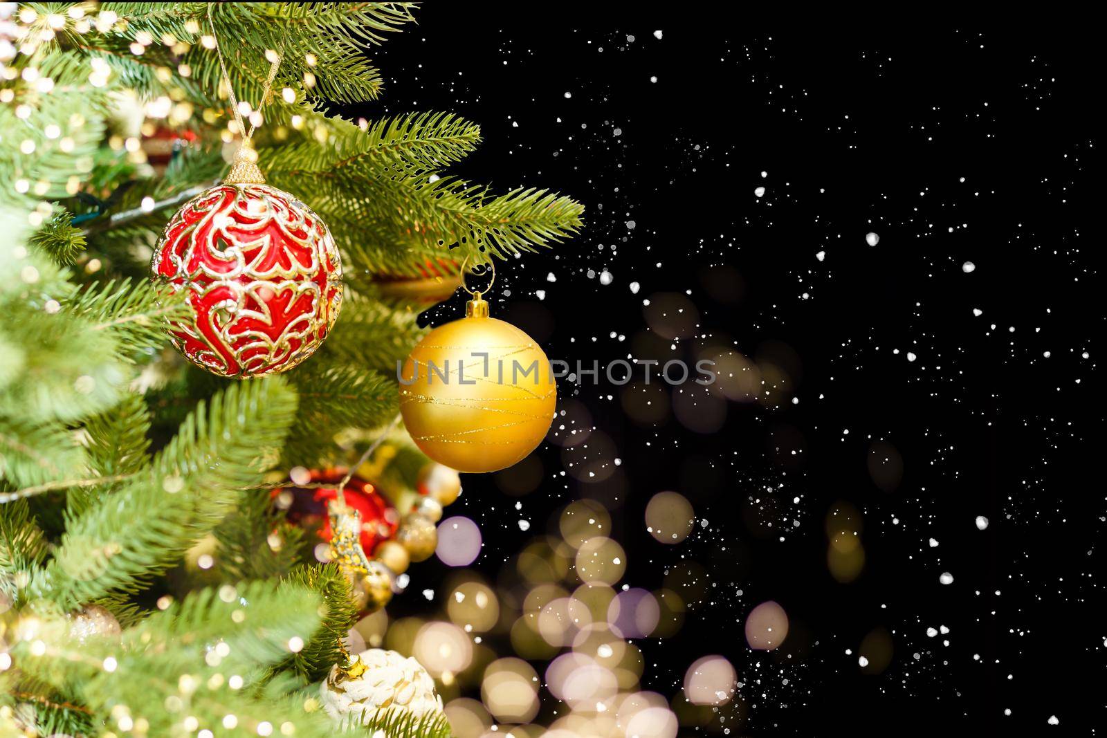 Green Tree. Decorated Christmas tree toys. Christmas tree on a bright background.