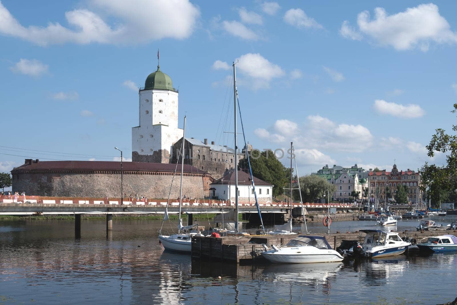 Vyborg, Leningrad region, Russia. - August 27, 2022. View of the medieval knight's castle from the city embankment. Selective focus.