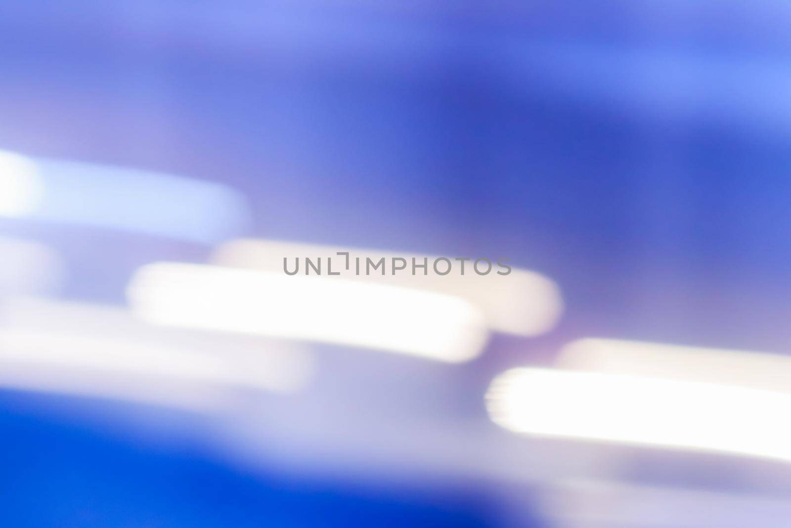 Abstract background, defocused textures and modern design concept - Evening city lights in motion