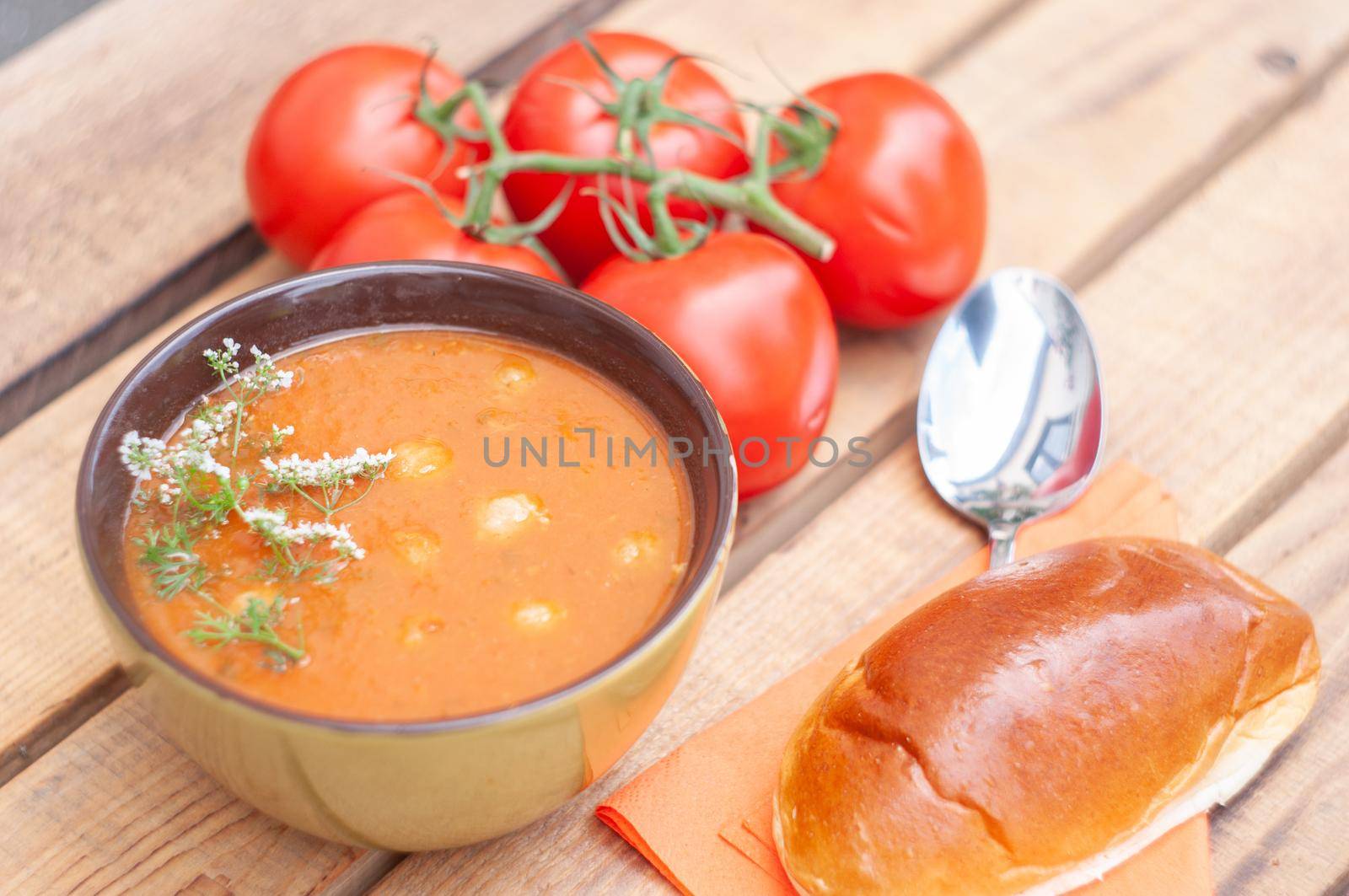 tomato soup with meat balls, a traditional Belgian dish, served with a bun, exotic food. High quality photo