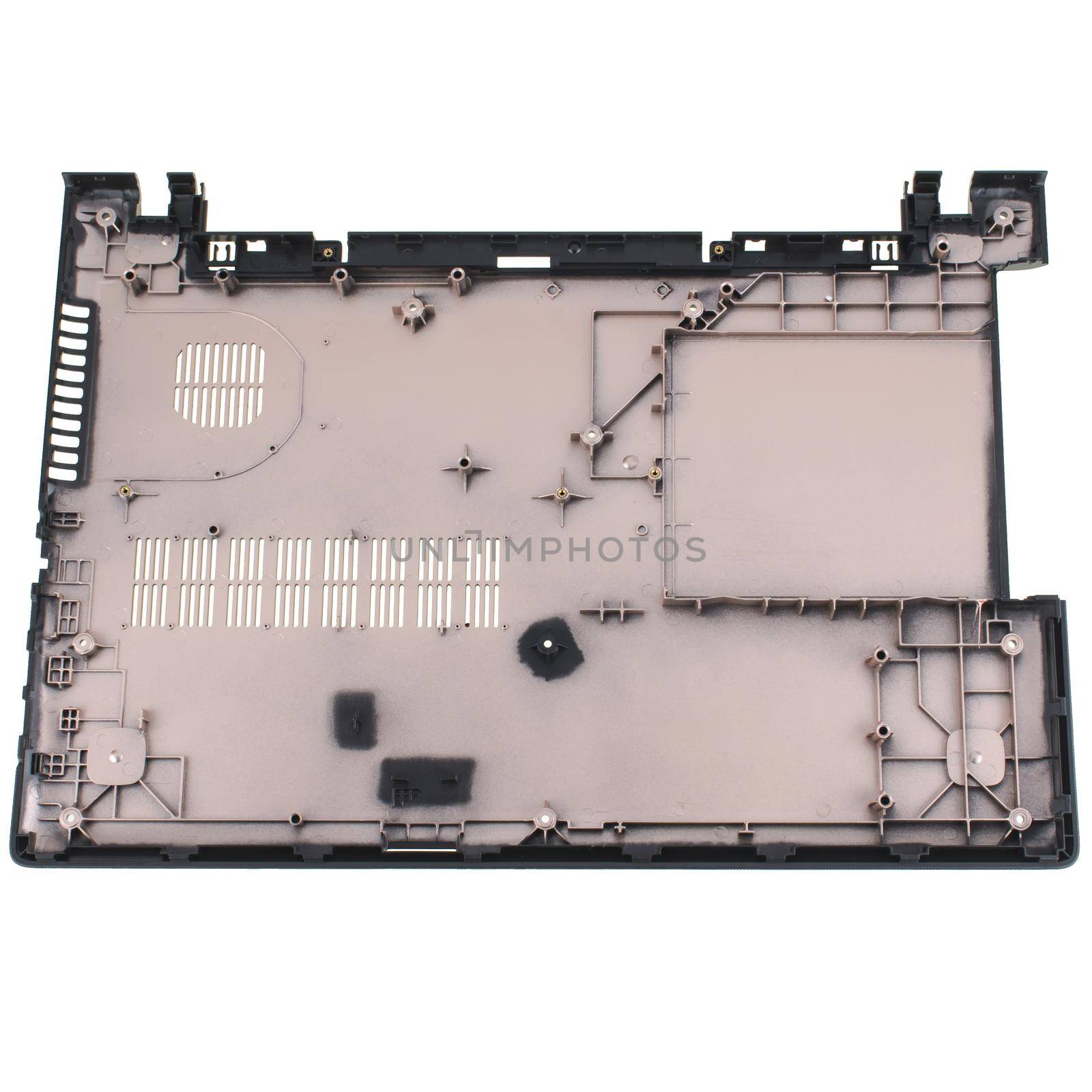 part of the case from a laptop, the bottom cover, a spare part for a laptop, on a white background in isolation