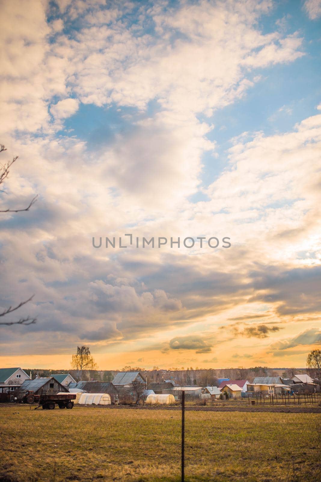 russian village landscape at sunset.