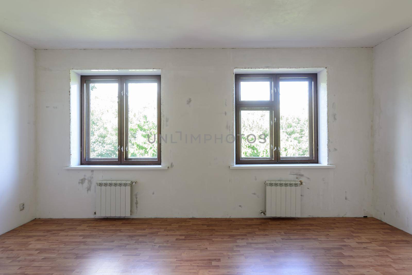 View of two windows in a room with a fine finish a