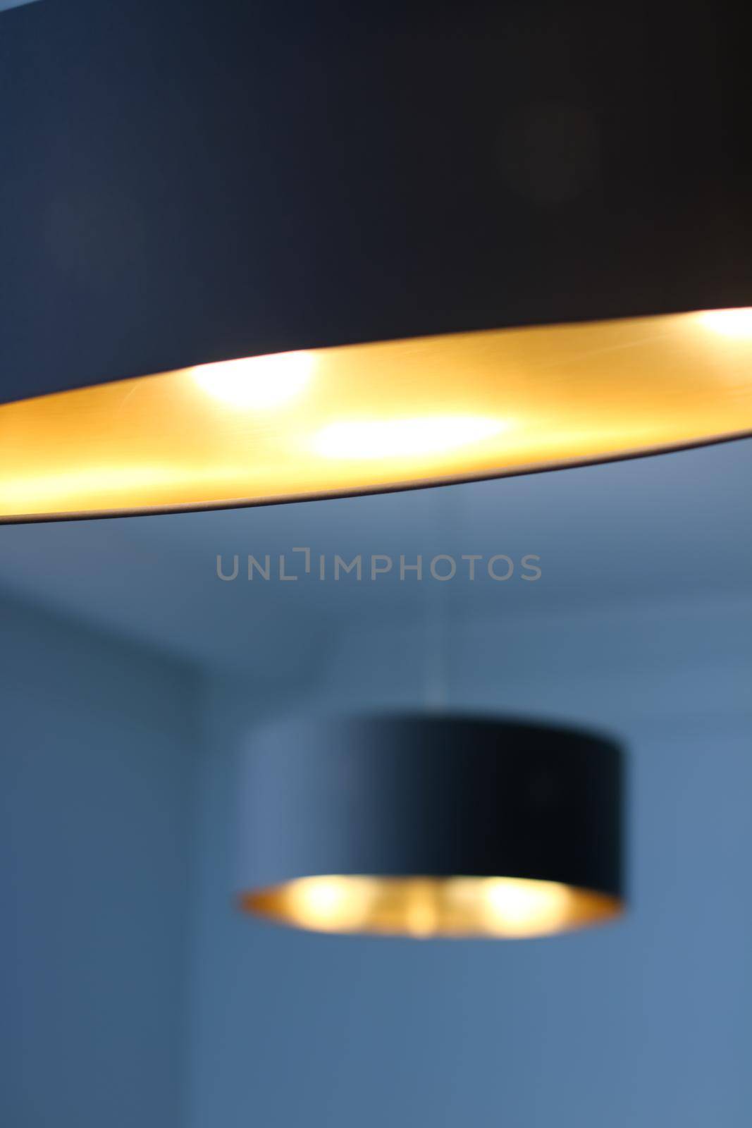 Golden lamp in a room, elegant modern home decor lighting by Anneleven