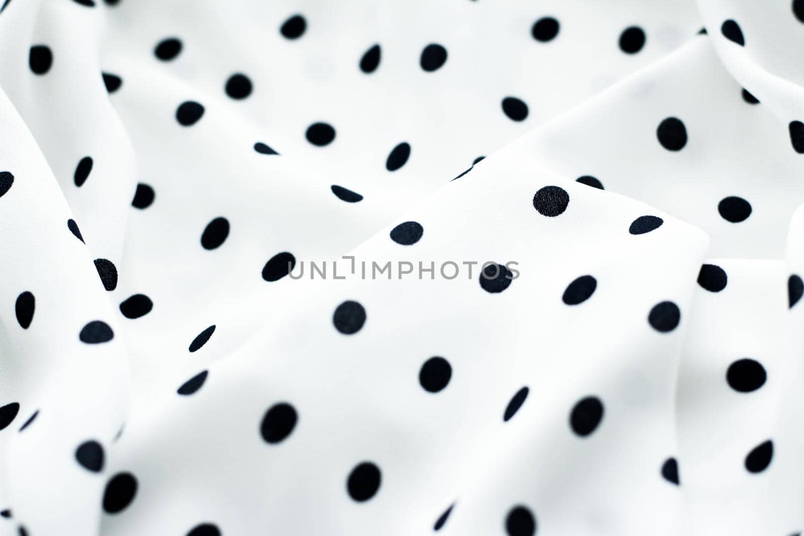 Fashion design, interior decor and vintage material concept - Classic polka dot textile background texture, black dots on white luxury fabric design pattern