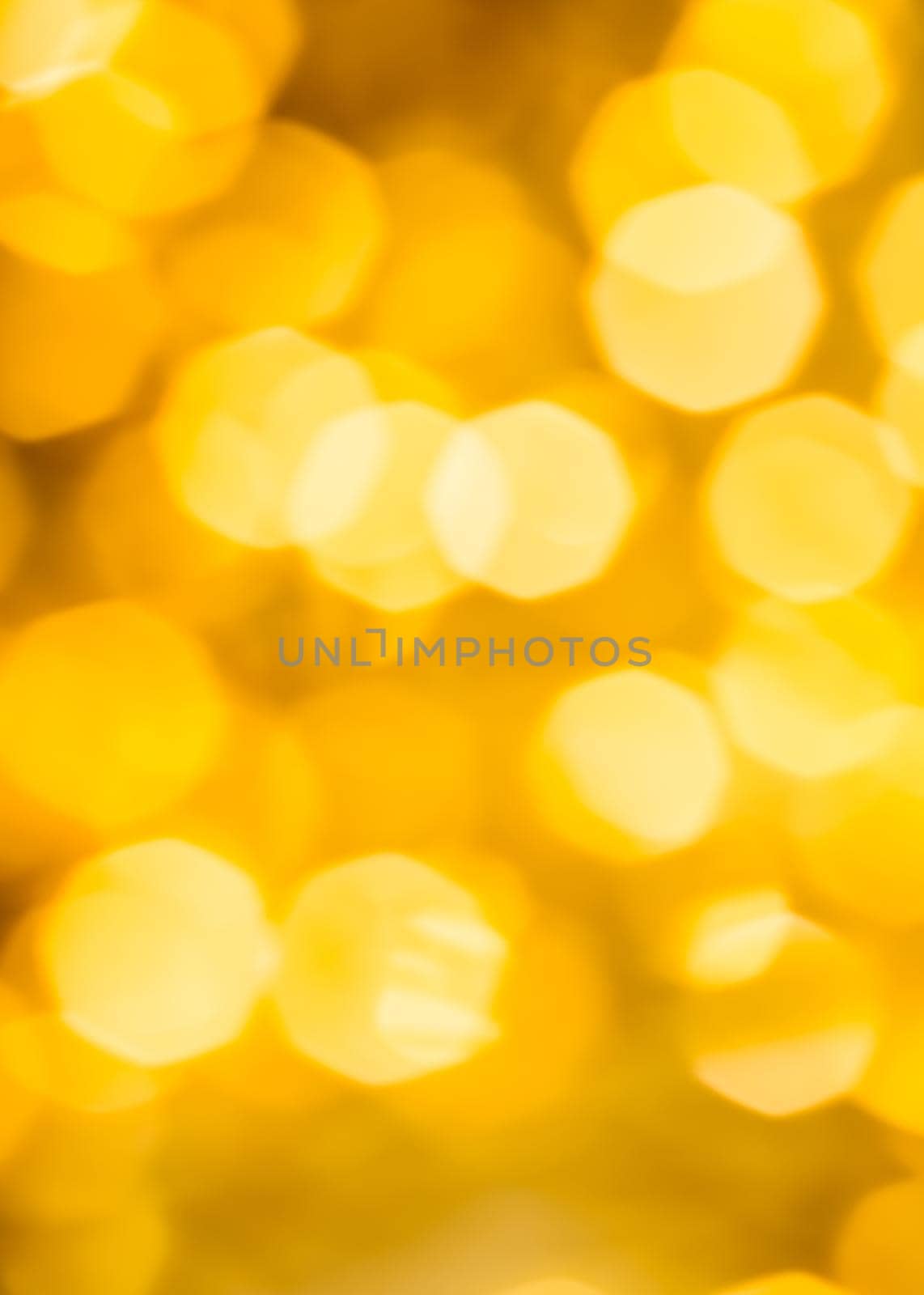 Golden Christmas lights, New Years Eve fireworks and abstract texture concept - Glamorous gold shiny glow and glitter, luxury holiday background