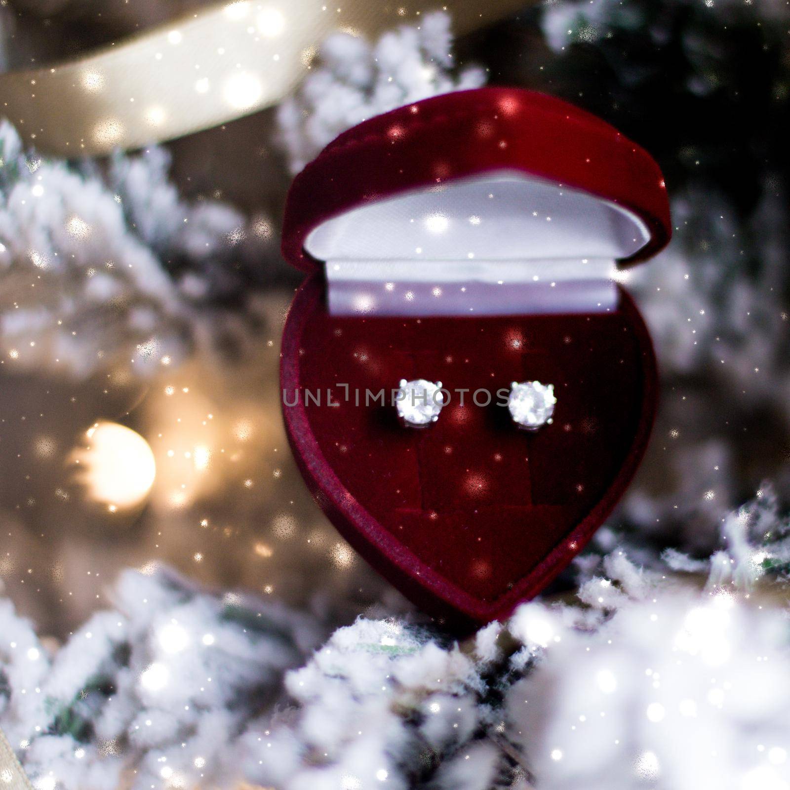 Timeless luxury, romantic proposal and happy celebration concept - Diamond earrings in heart shaped jewellery gift box on Christmas tree, love present for New Years Eve, Valentines Day and winter holidays
