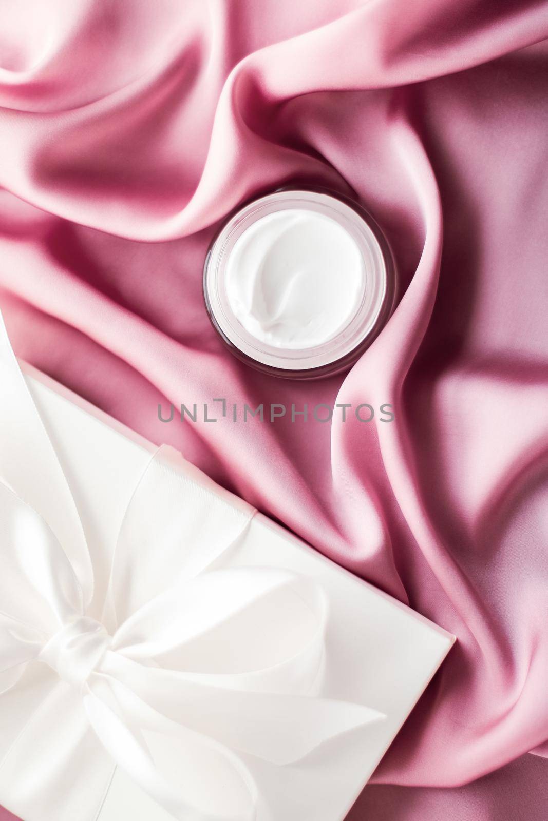 Beauty, cosmetics and skincare styled concept - Luxury moisturizing cream and a white gift box