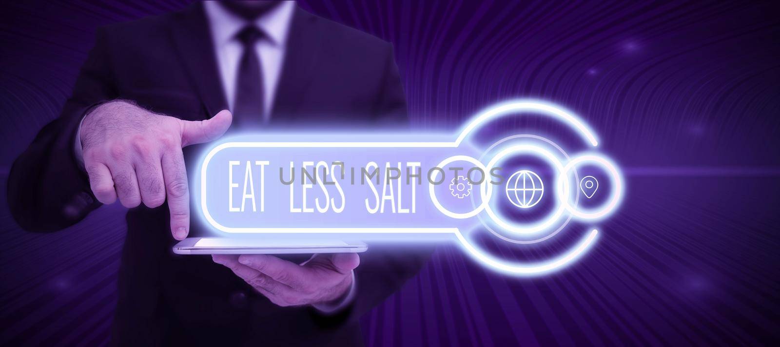 Hand writing sign Eat Less Salt. Business showcase Reduce the amount of sodium in your diet eating healthy Oval Thought Bubbles Representing Chatting And Social Networking Media. by nialowwa