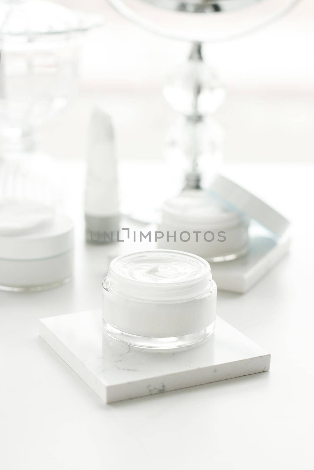 Luxury skincare cosmetics in a bathroom by Anneleven