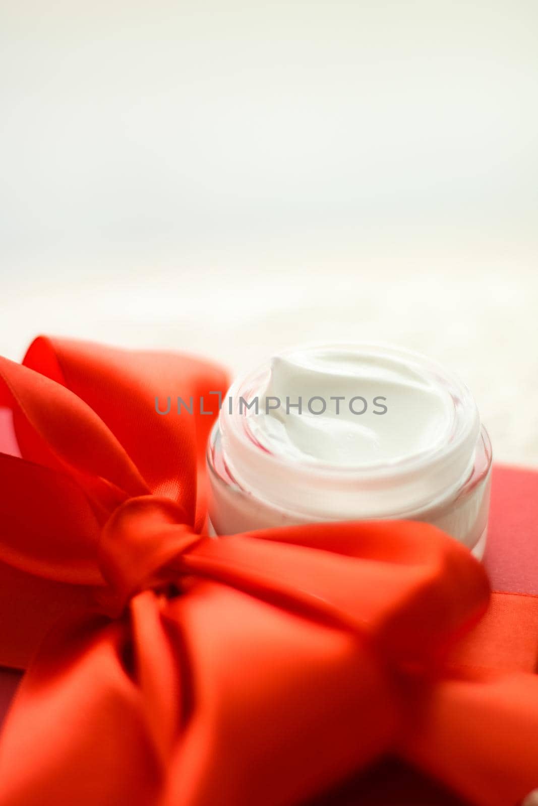 Luxury face cream jar and red gift box by Anneleven