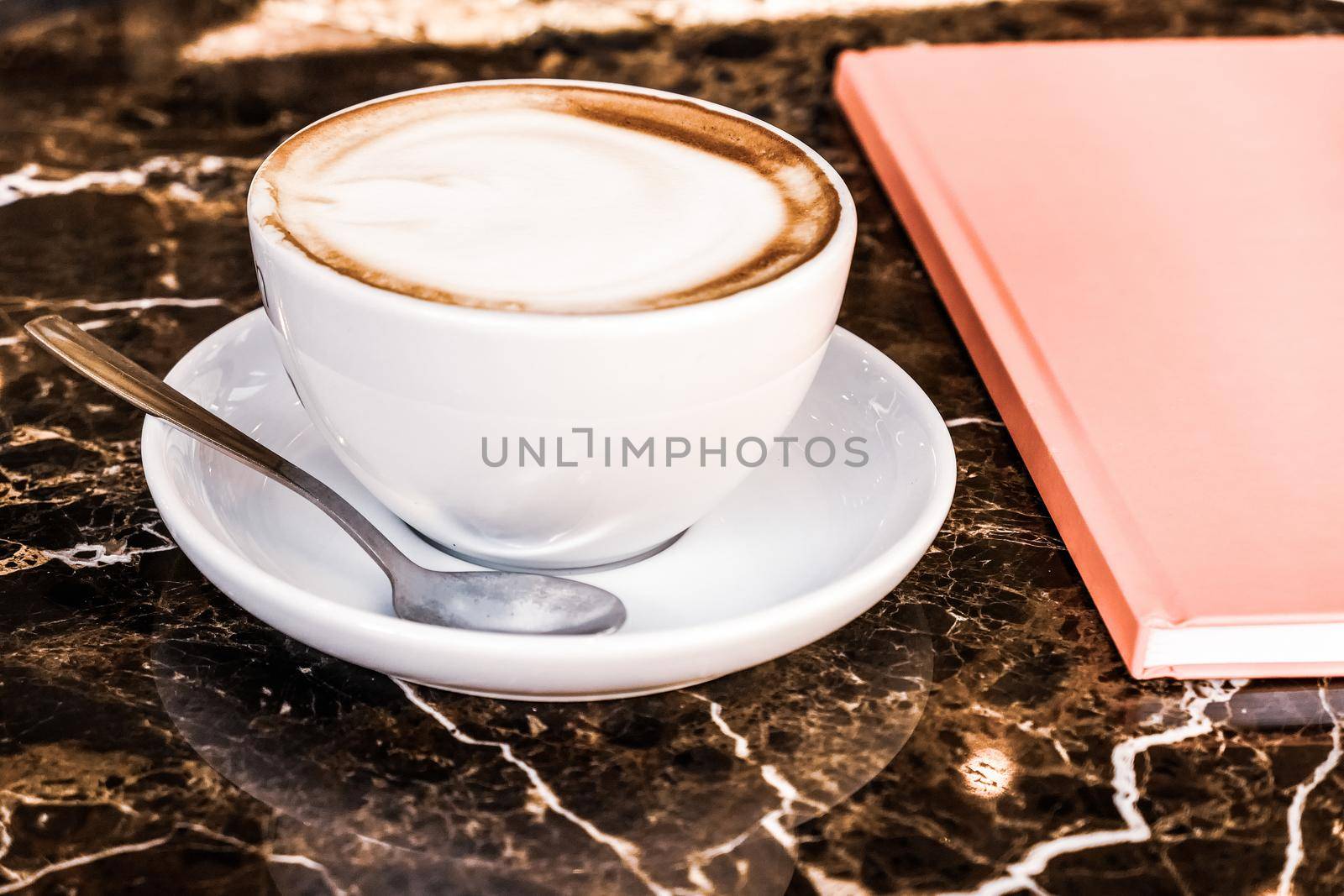 Cappuccino in a restaurant, at a coffee break by Anneleven