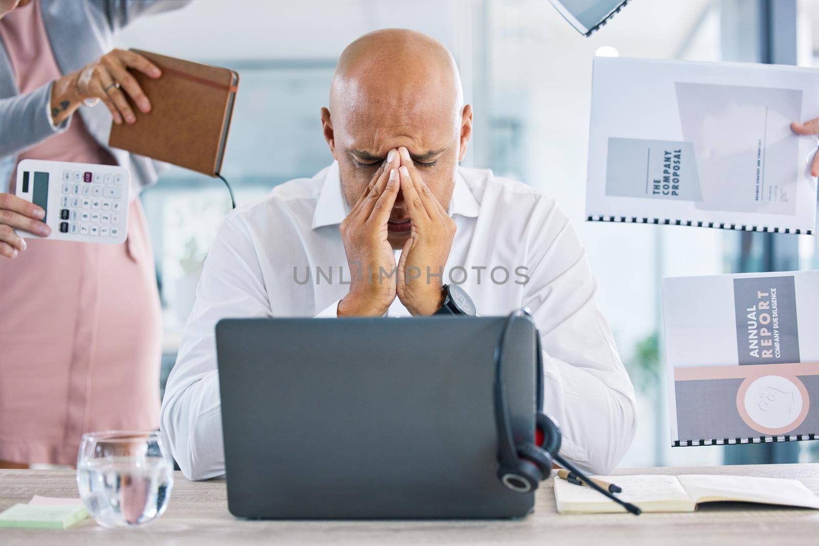 Stress, deadline and mental burnout with anxious, worried and frustrated business man in office. Overworked, annoyed and tired worker with headache, pressure and trouble for demands in busy workplace.