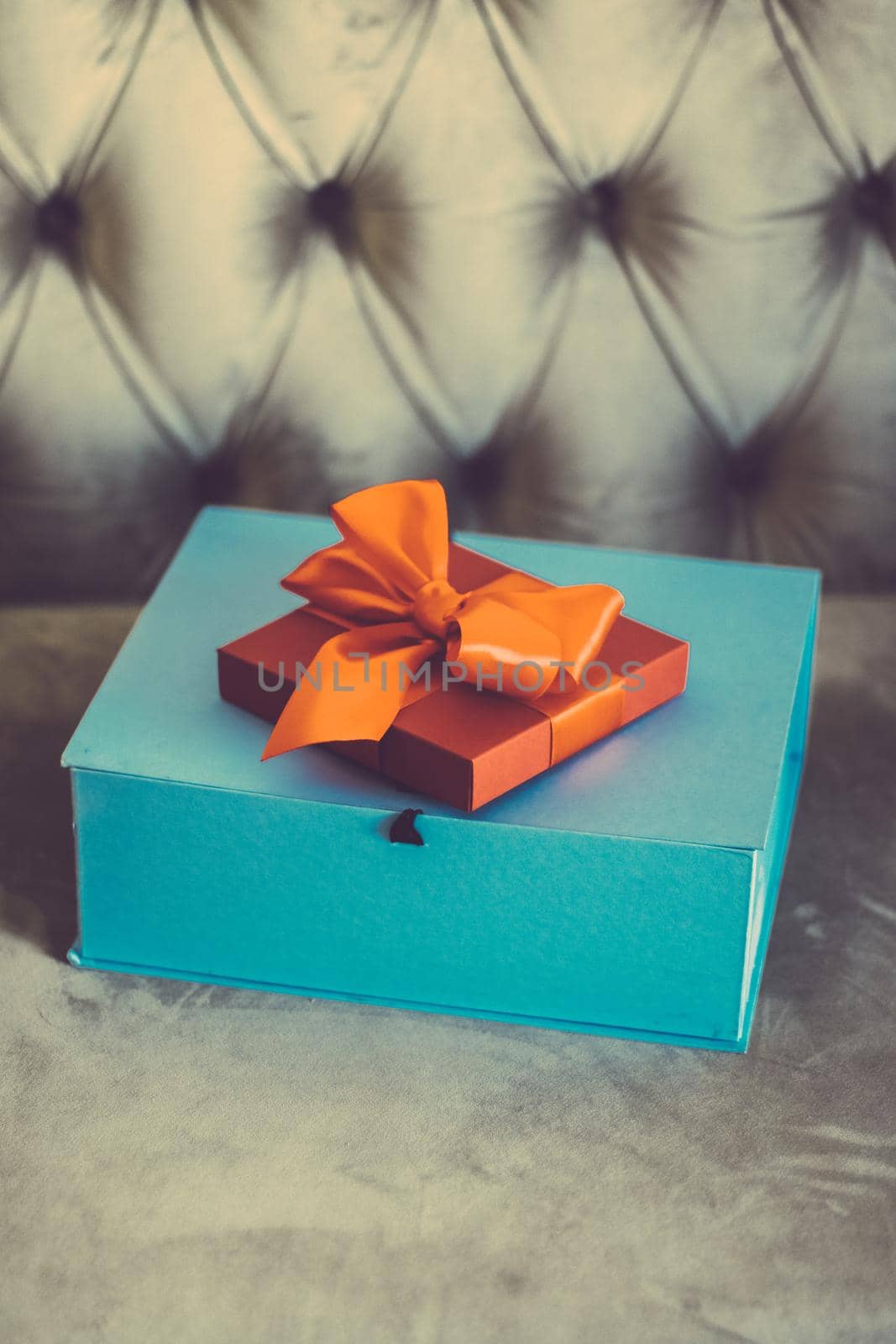 Birthday present, shop sale promotion and autumn decoration concept - Vintage luxury holiday orange gift box with silk ribbon and bow, christmas or valentines day decor