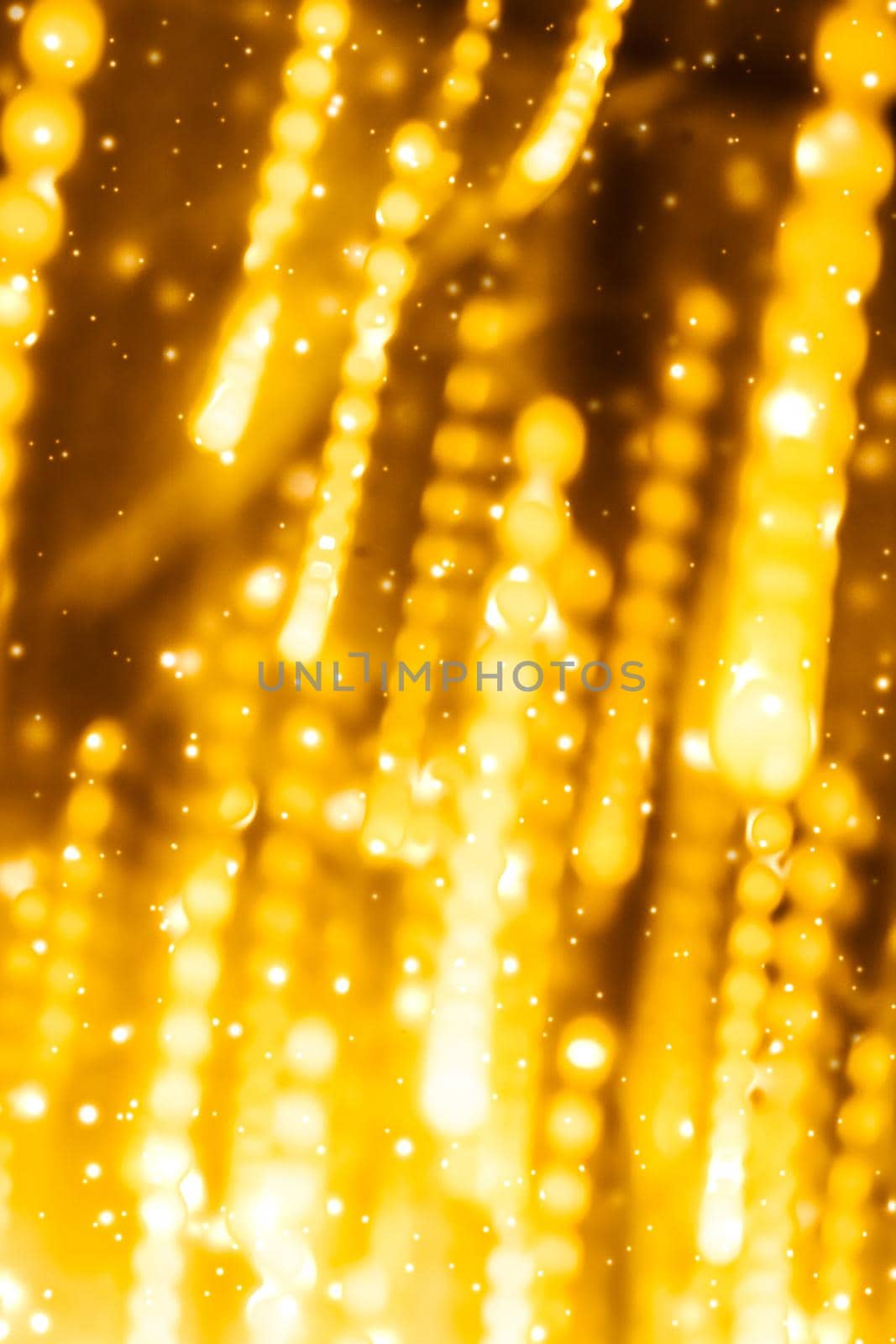 Glamorous gold shiny glow and glitter, luxury holiday background by Anneleven