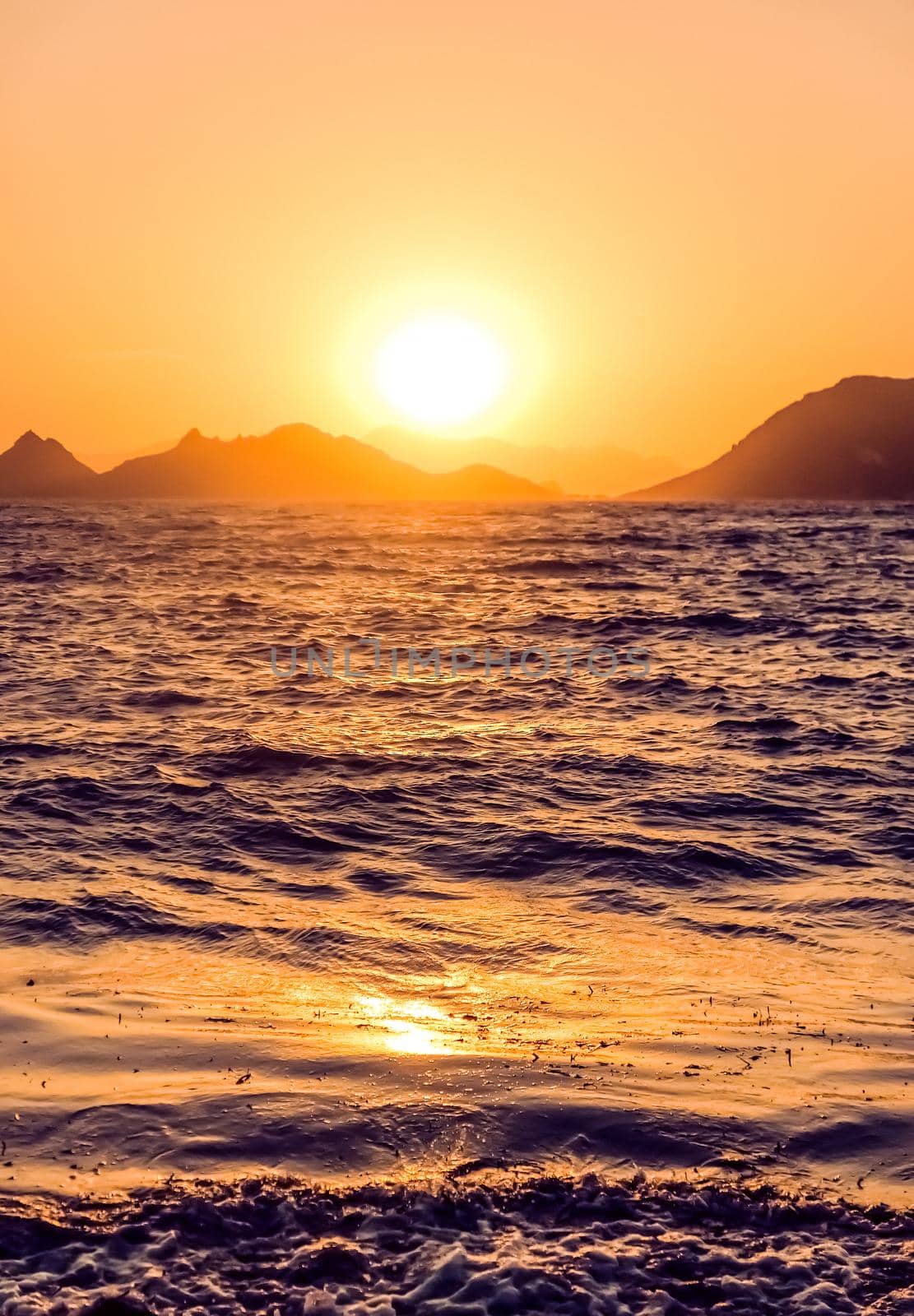 Summer sunset at the Mediterranean sea coast, seascape and mountain view by Anneleven