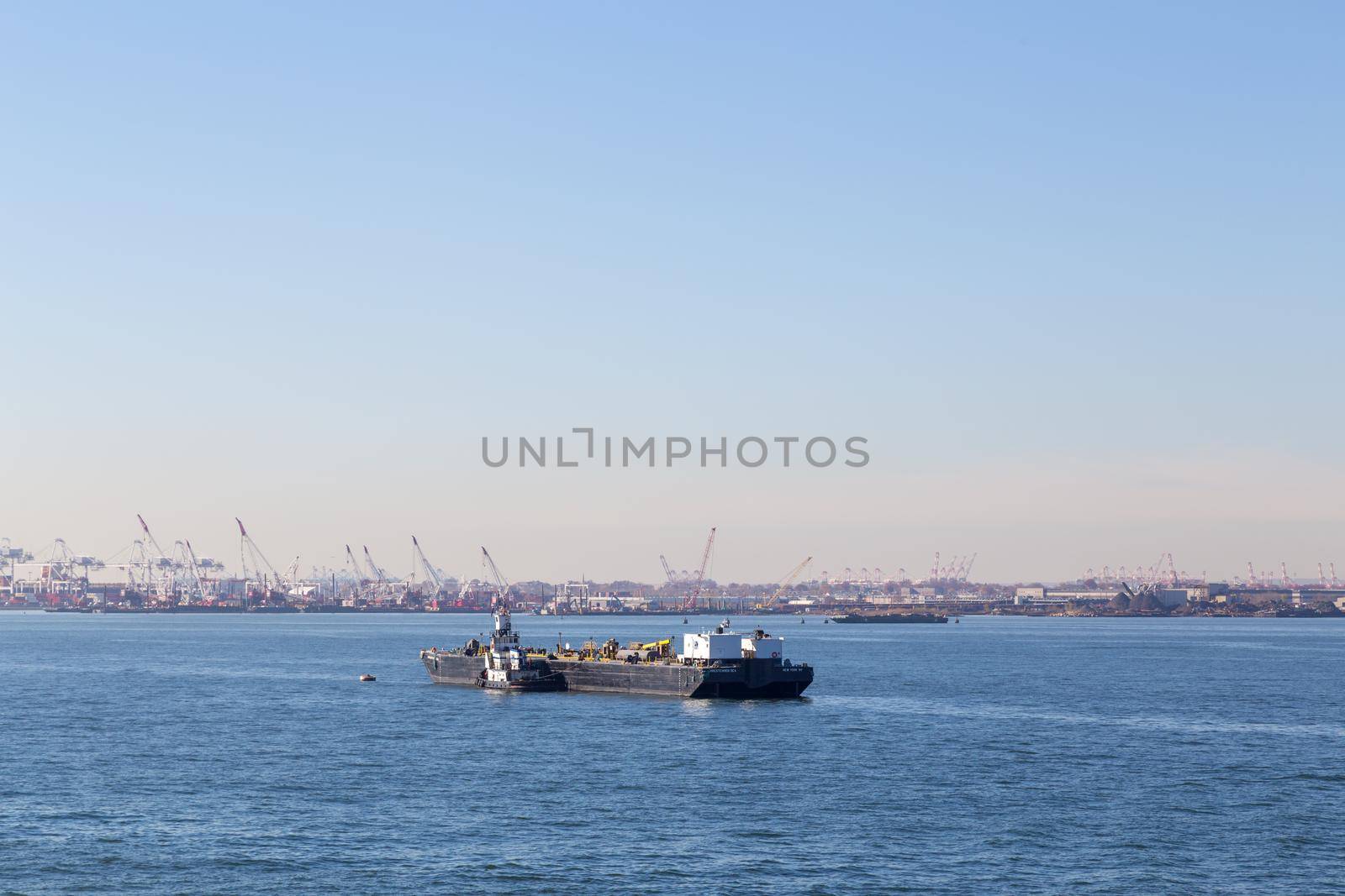 Bayonne, United States of America - November 18, 2016: Oil barge sailing just outside of Bayonne Port.