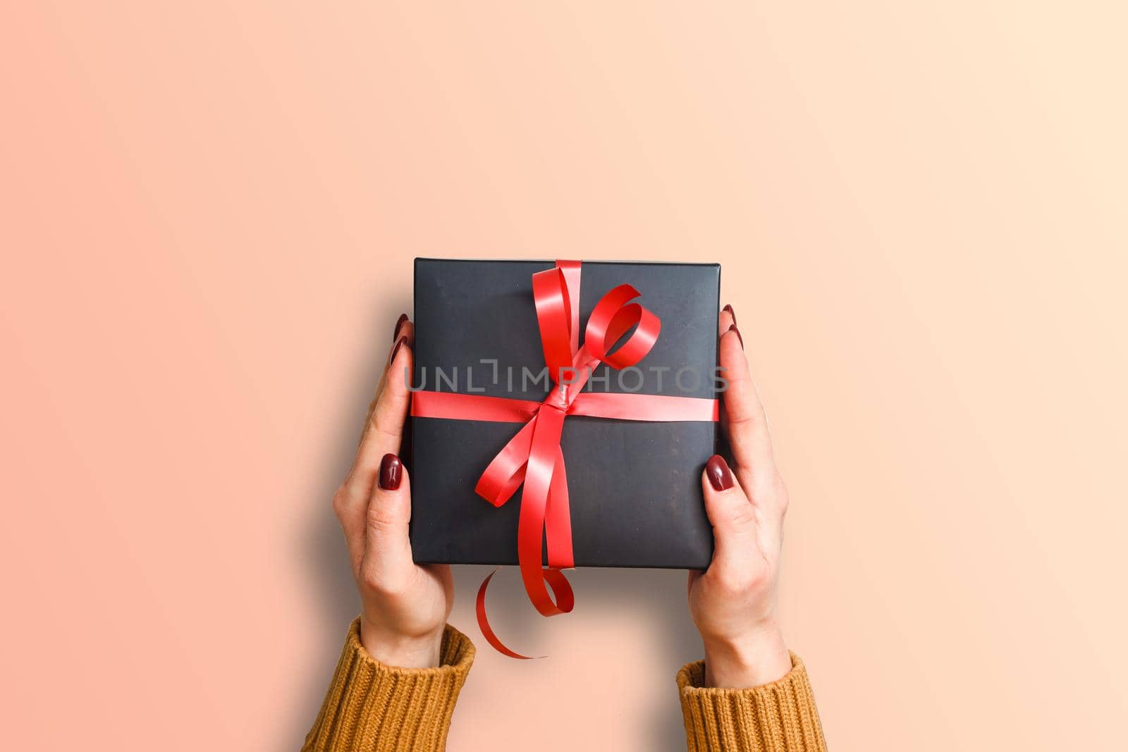 present with red ribbon on the blue background. Festive backdrop for holidays: Birthday, Valentines day, Christmas, New Year