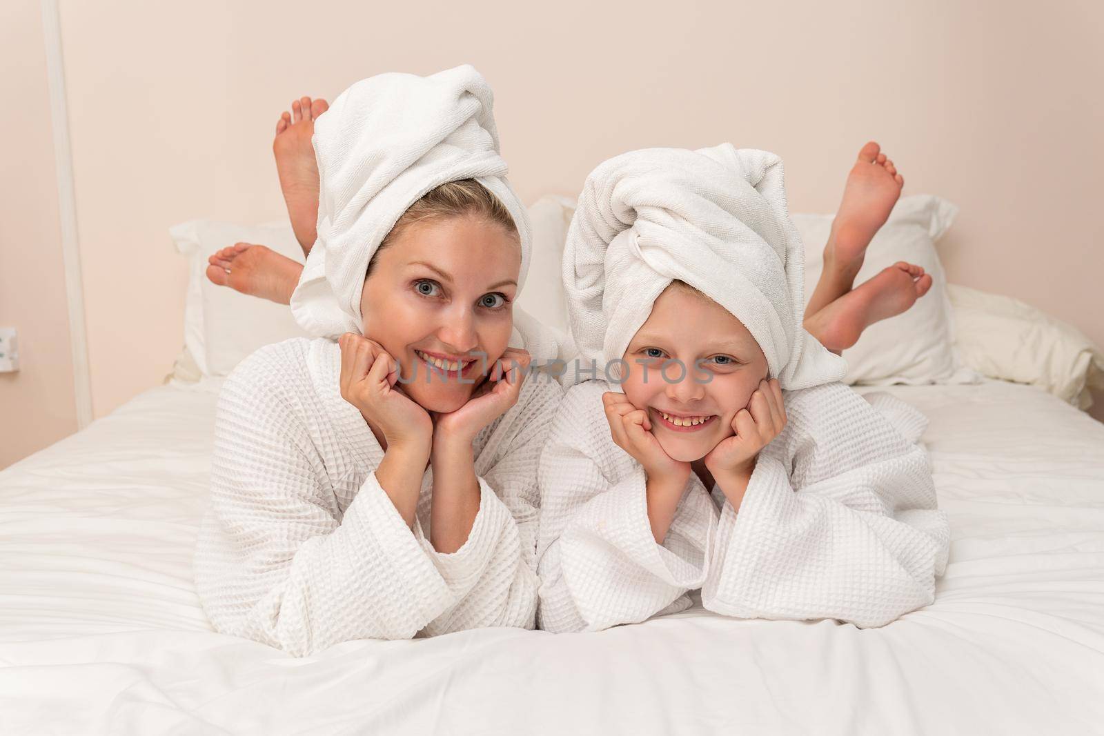 Daughter dries bath mom love smiling thinks elbows Creek copyspace, for portrait cute in dressing and happy spa, little background. Care funny fashion, by 89167702191