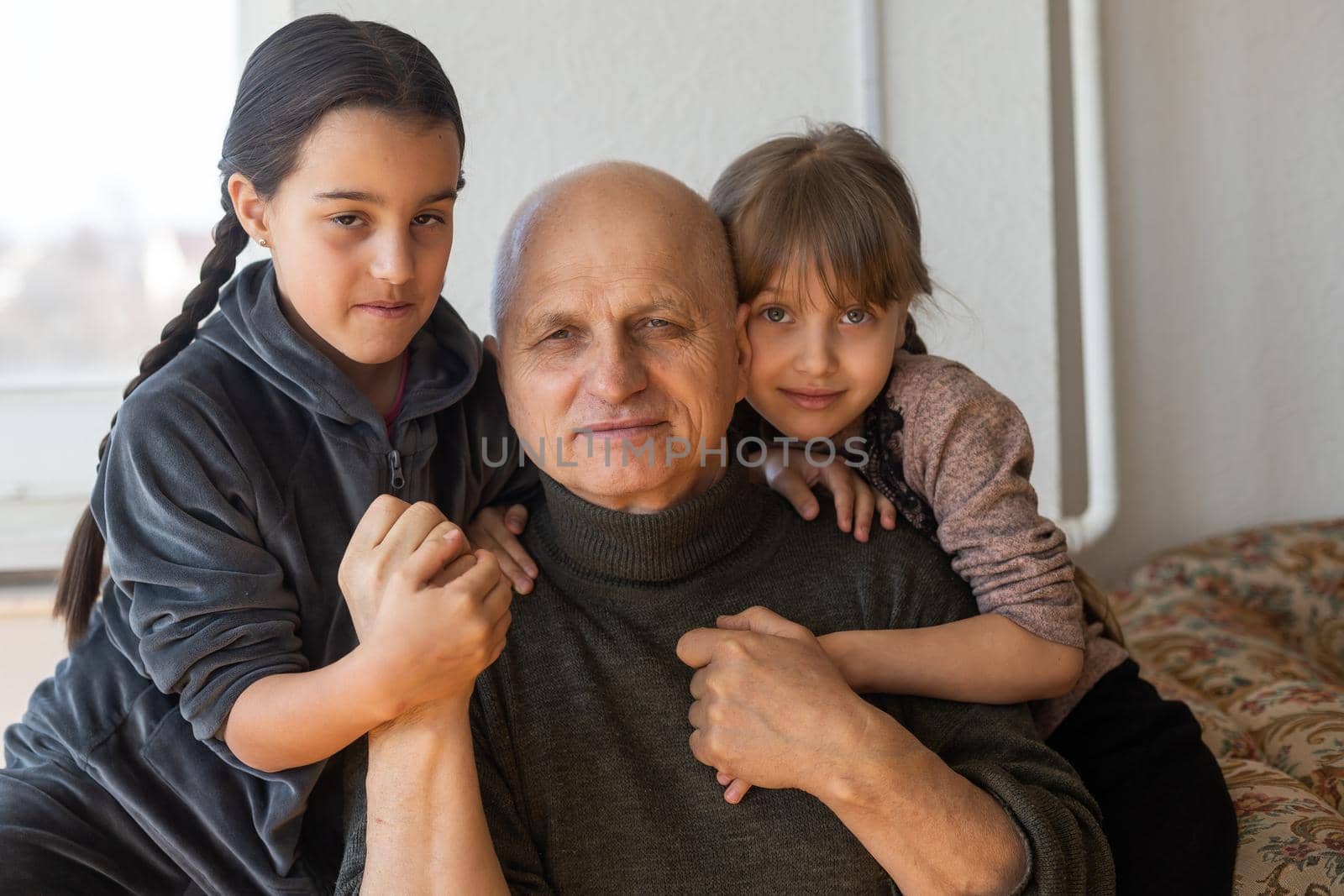 Family bonding. grandfather and child holding hands together, closeup view. Panorama by Andelov13