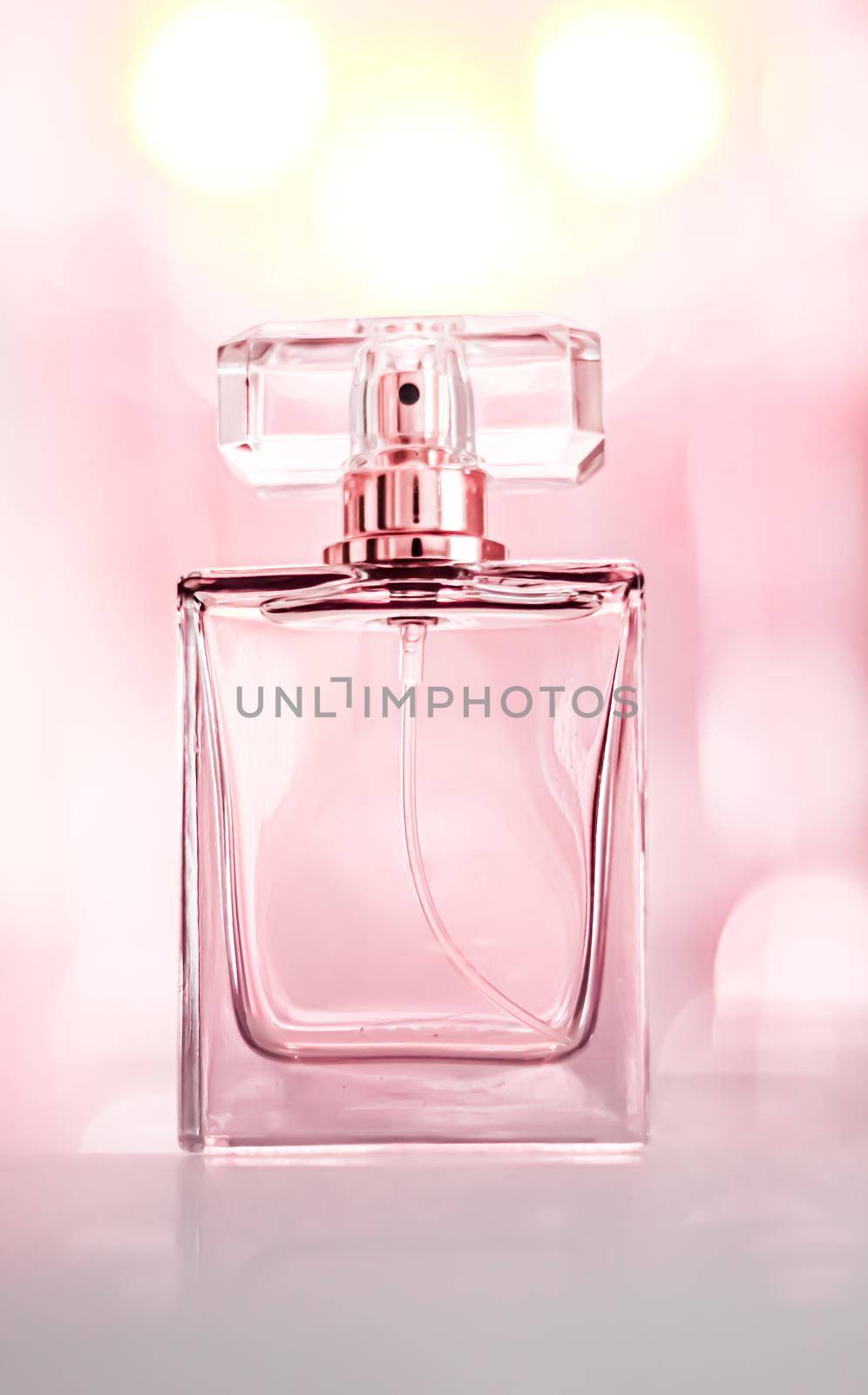 Perfume bottle on glamour background, floral feminine scent, fragrance and eau de parfum as luxury holiday gift, cosmetic and beauty brand present concept