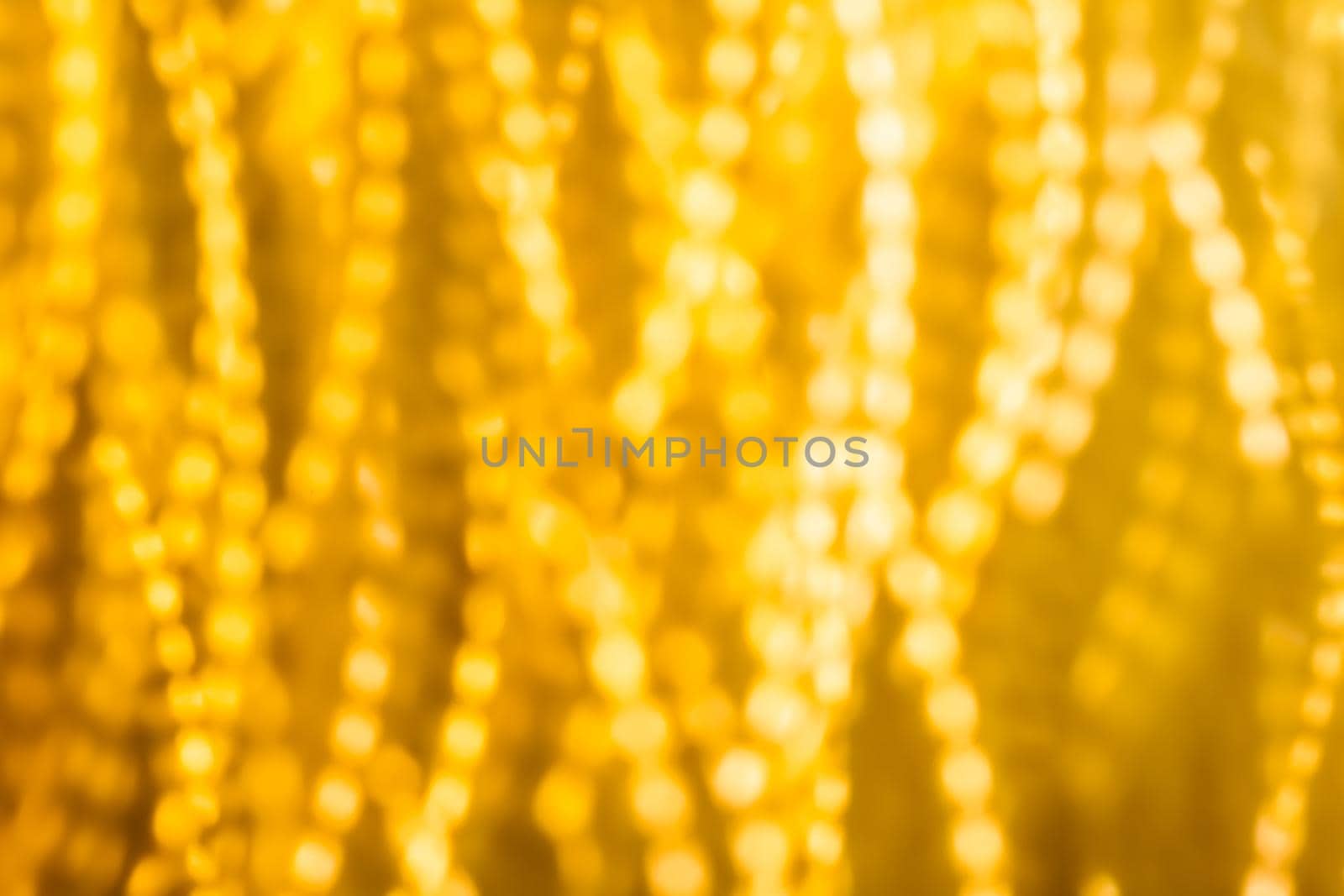 Golden Christmas lights, New Years Eve fireworks and abstract texture concept - Glamorous gold shiny glow and glitter, luxury holiday background