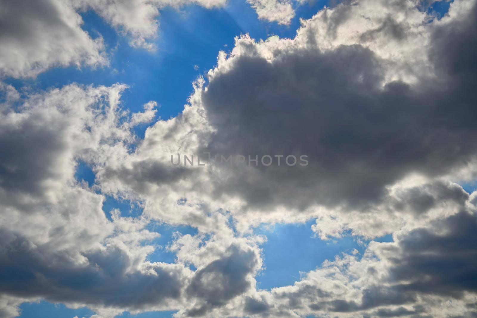 Beautiful, dramatic, colorful clouds and blue sky.