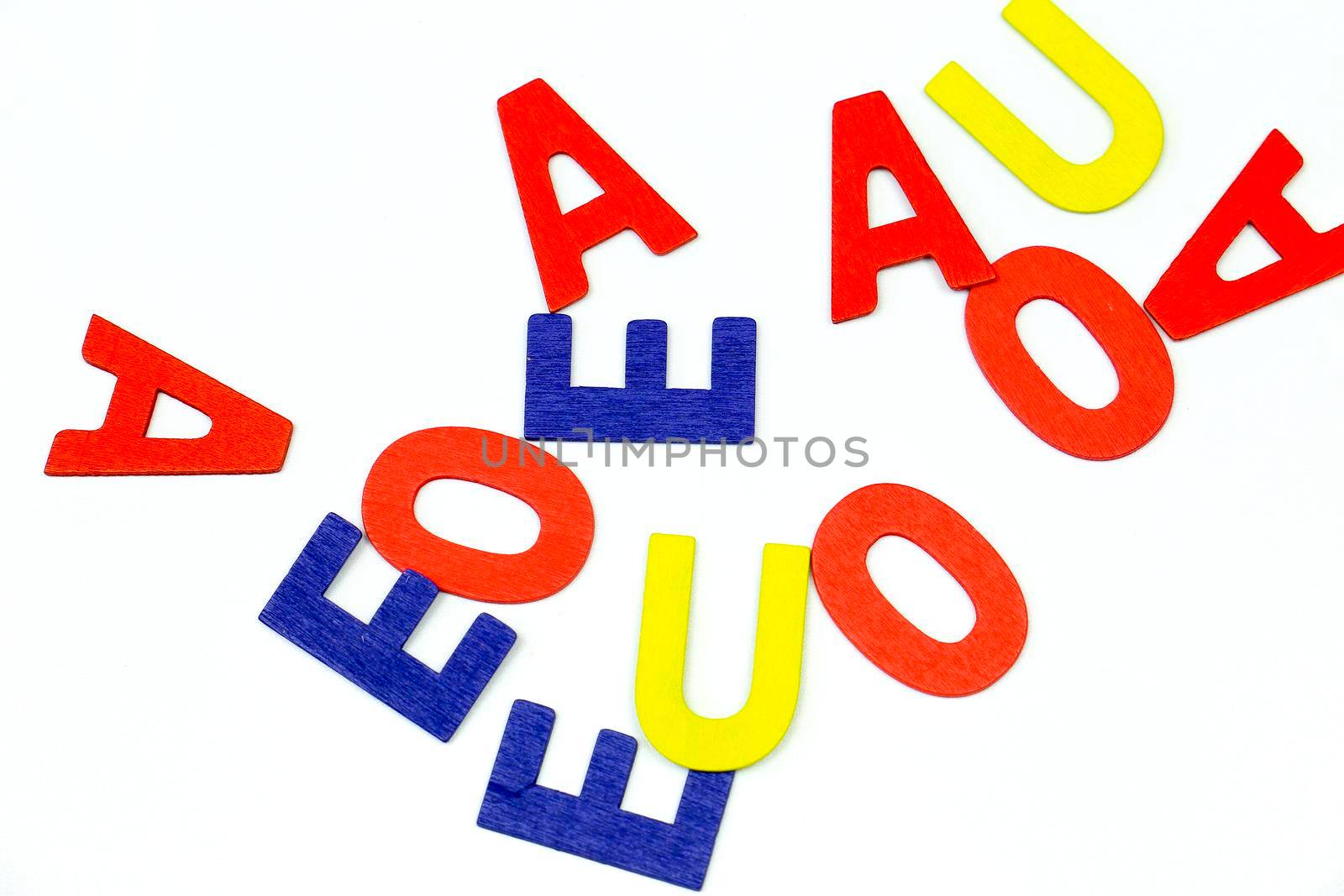 Multicolored vowels on white background by soniabonet