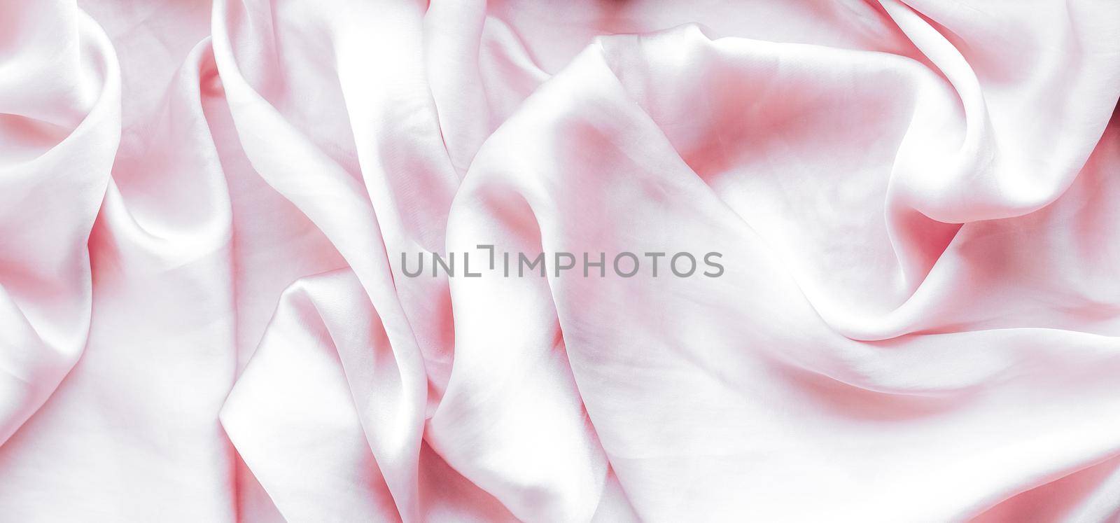 Elegant fabric texture, abstract backdrop and modern pastel colours concept - Pink soft silk waves, flatlay background