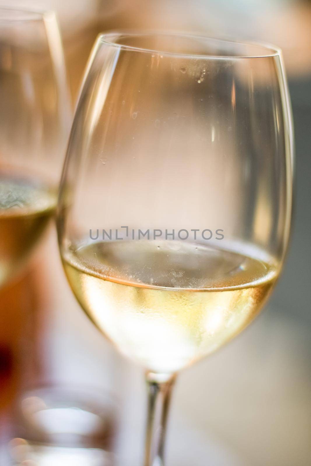 Winery, fine dining and celebration concept - French white wine in a restaurant in Paris, travel experience