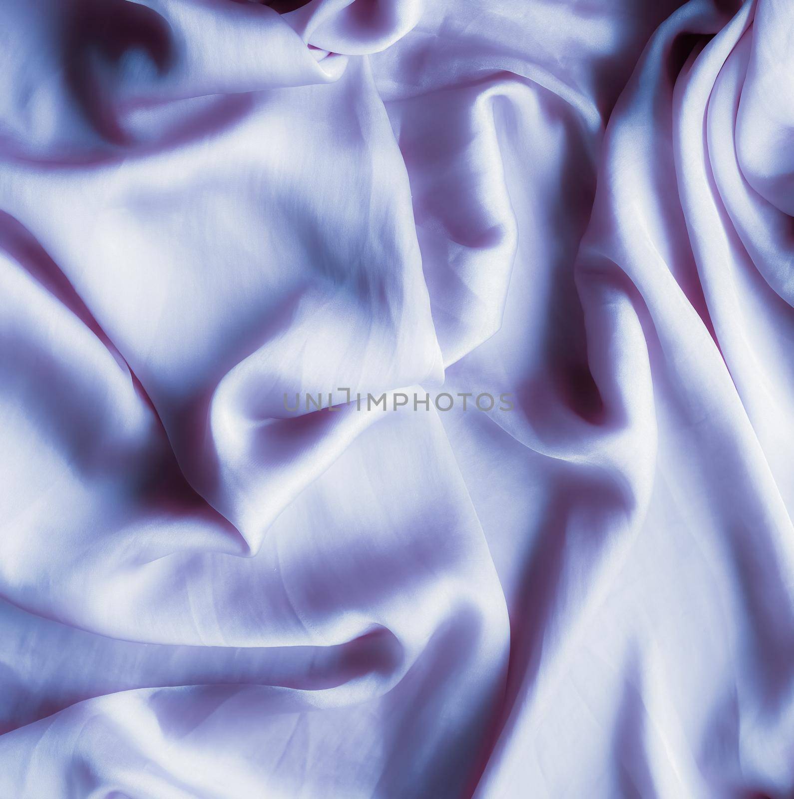 Elegant fabric texture, abstract backdrop and modern pastel colours concept - Purple soft silk waves, flatlay background