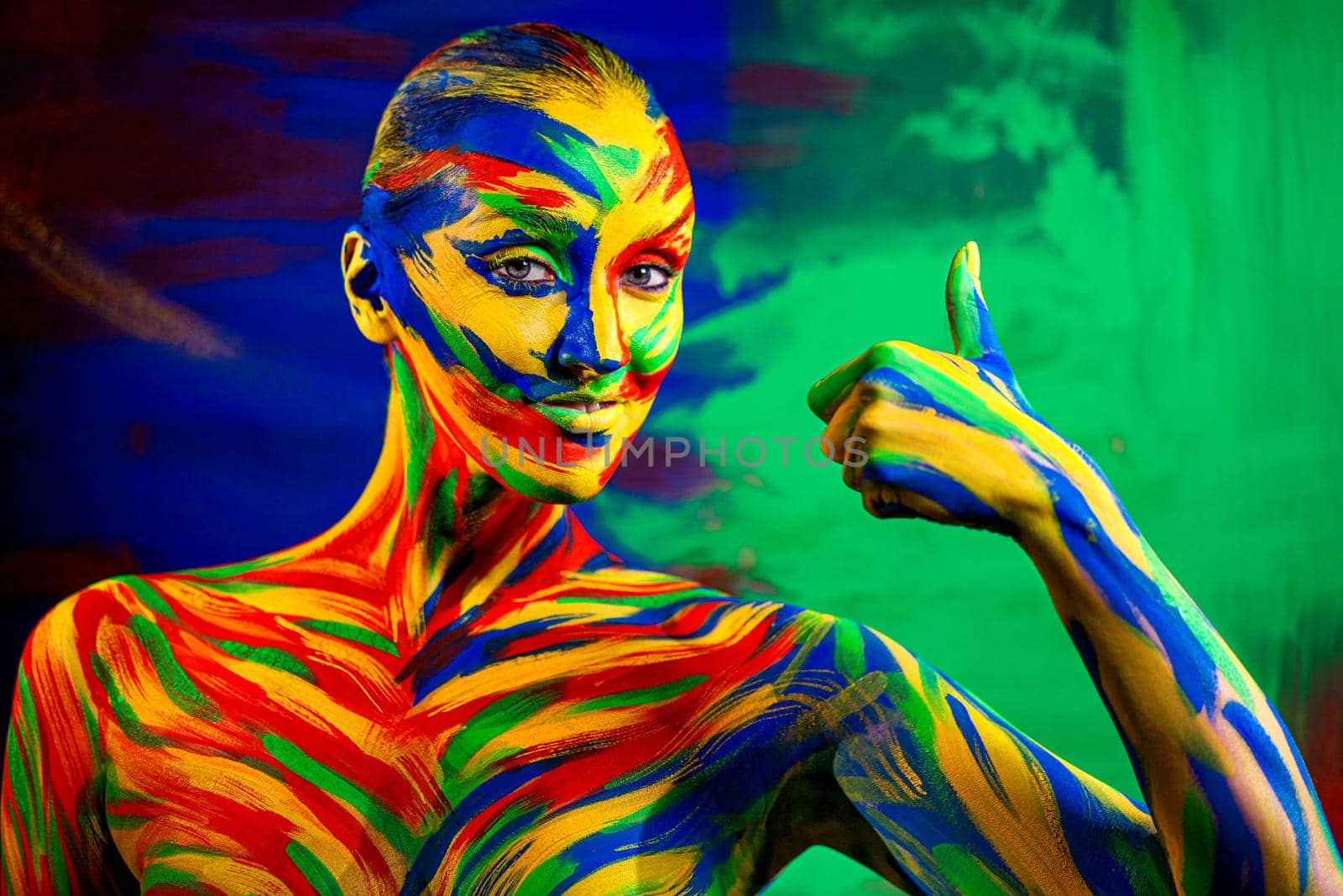 Color art face and body paint of woman for inspiration. Abstract portrait of the bright beautiful girl with colorful make-up and bodyart. by MikeOrlov