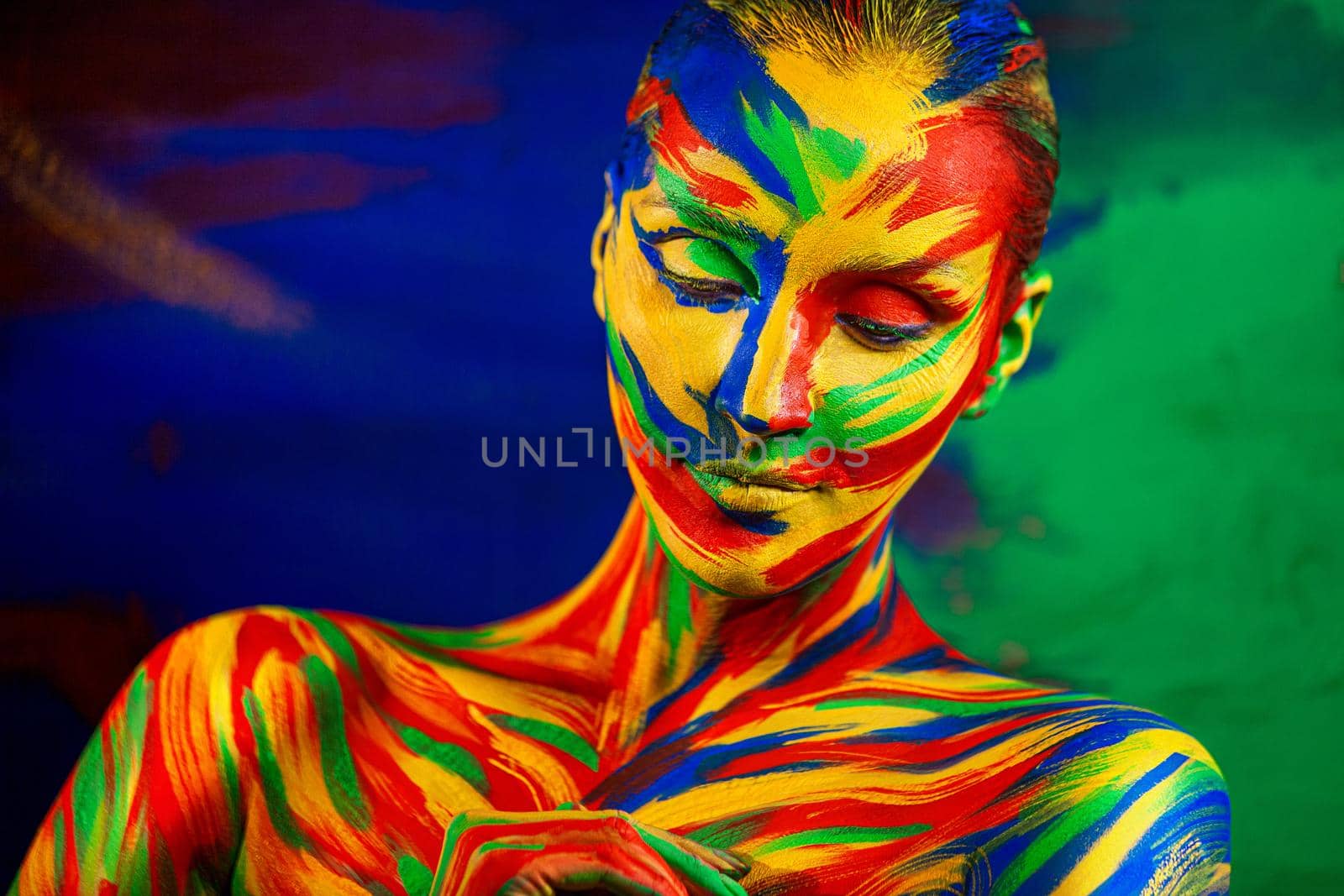 Art fashion makeup. Color face of woman for inspiration. Abstract portrait of the bright beautiful girl with colorful make-up and bodyart. by MikeOrlov