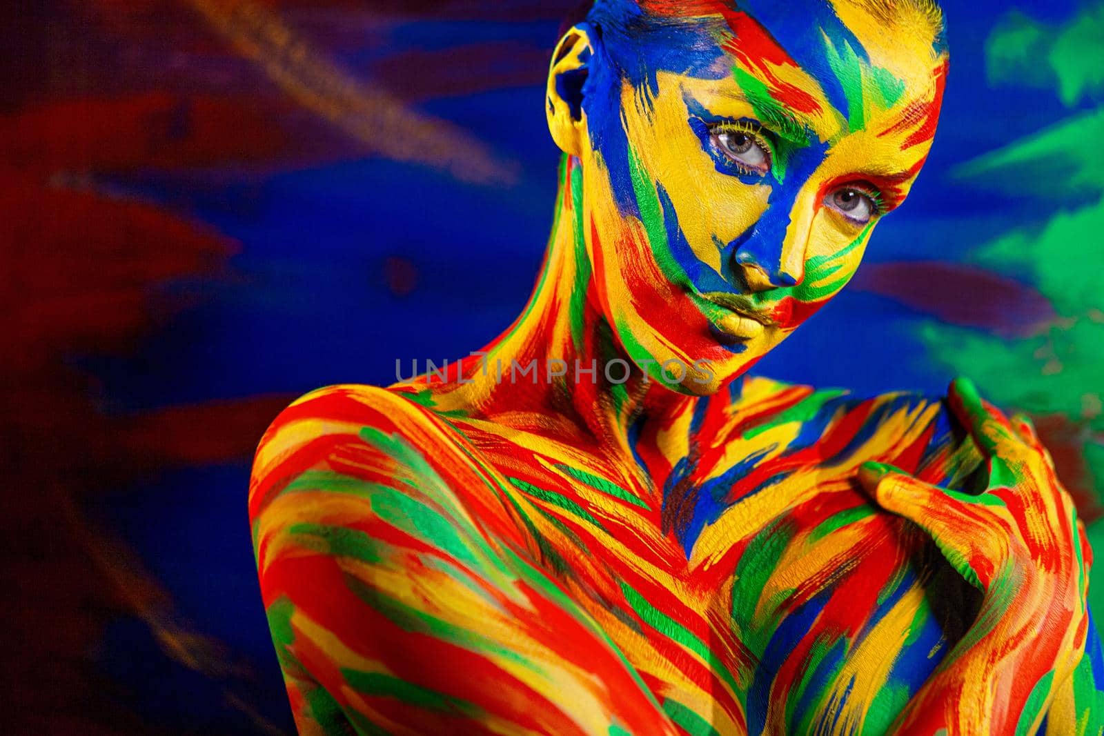 Art fashion makeup and body painting . Color face of woman for inspiration. Abstract portrait of the bright beautiful girl with colorful make-up and bodyart. by MikeOrlov