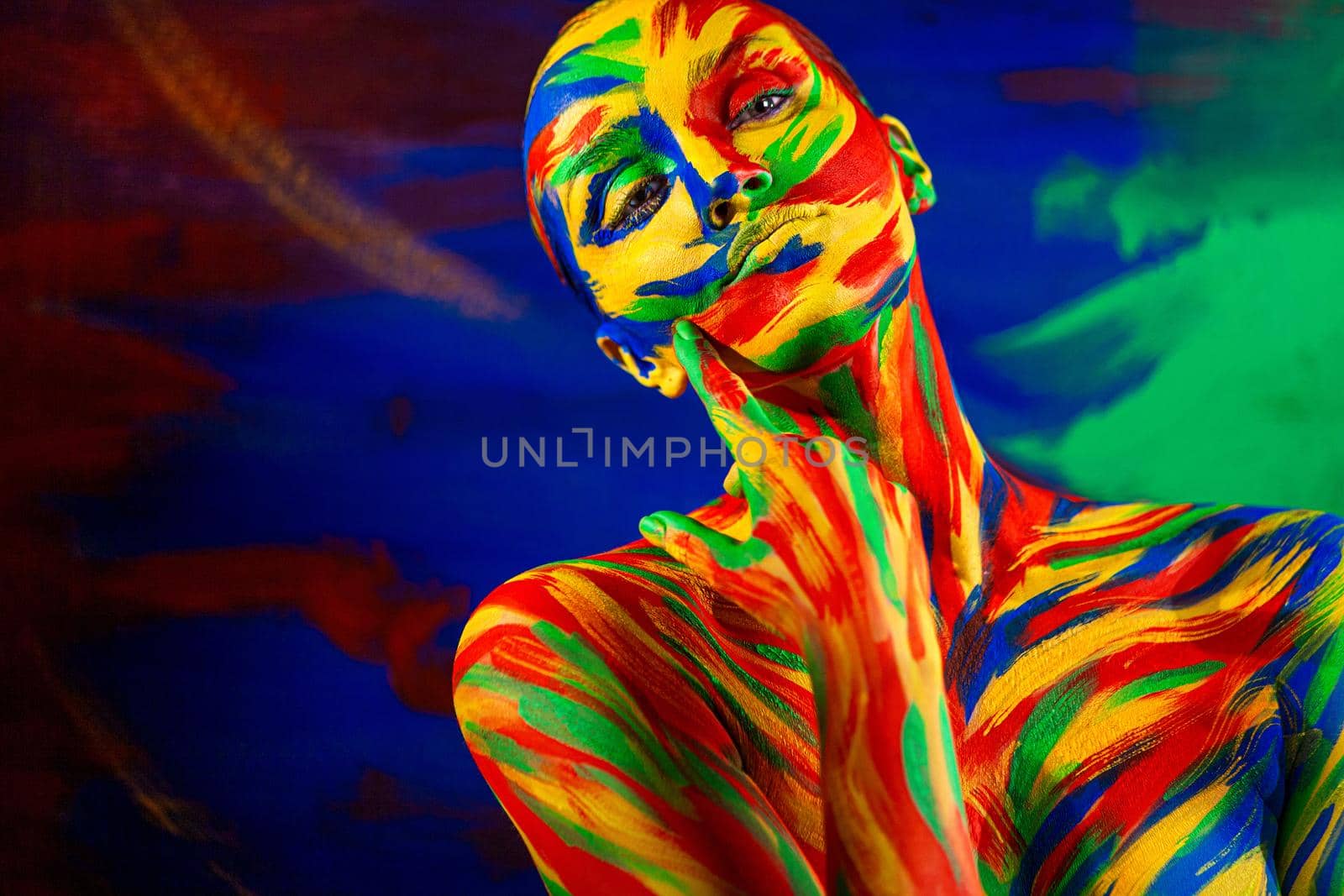 Color art face and body paint of woman for inspiration. Abstract portrait of the bright beautiful girl with colorful make-up and bodyart. by MikeOrlov